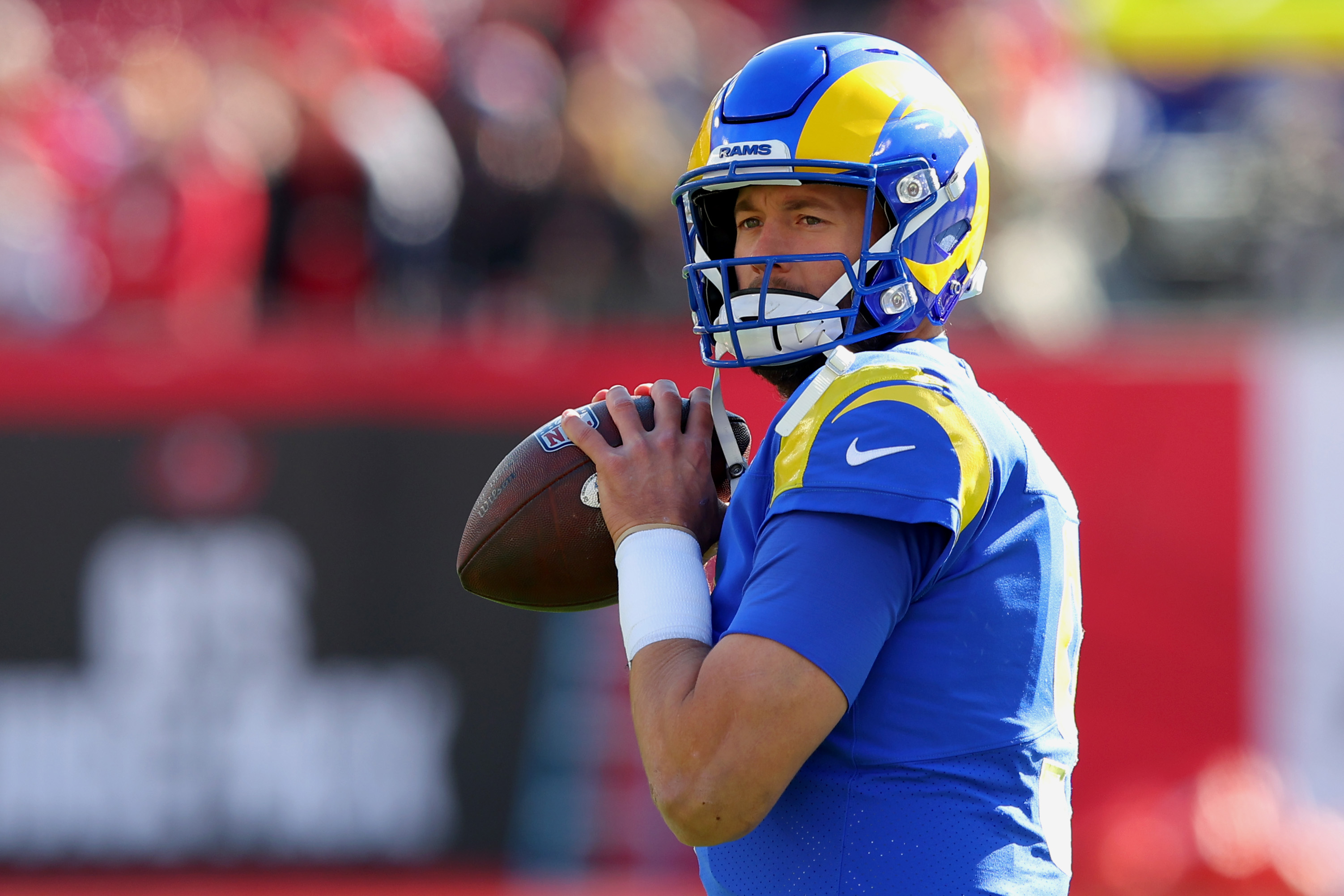 Matthew Stafford prepares to throw a football during NFC Divisional Playoff game against the Tampa Bay Buccaneers