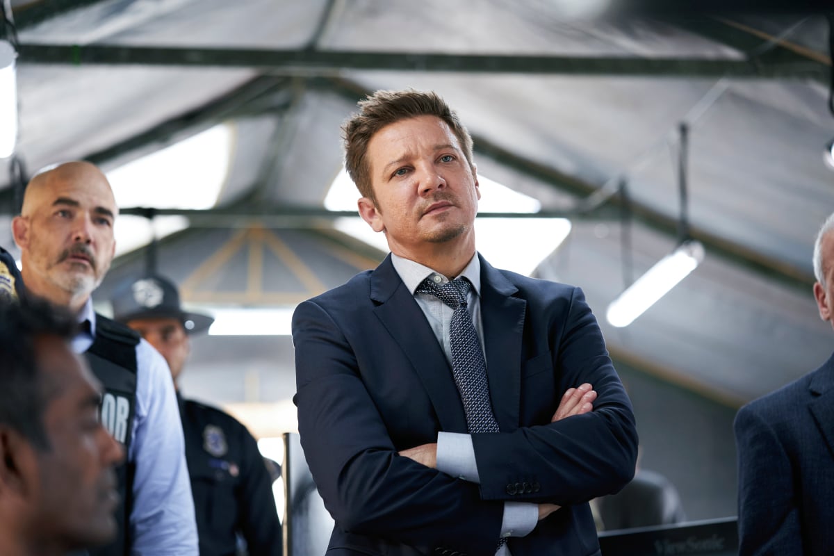 Mayor of Kingstown Jeremy Renner wearing a suit and tie in an image from season 1