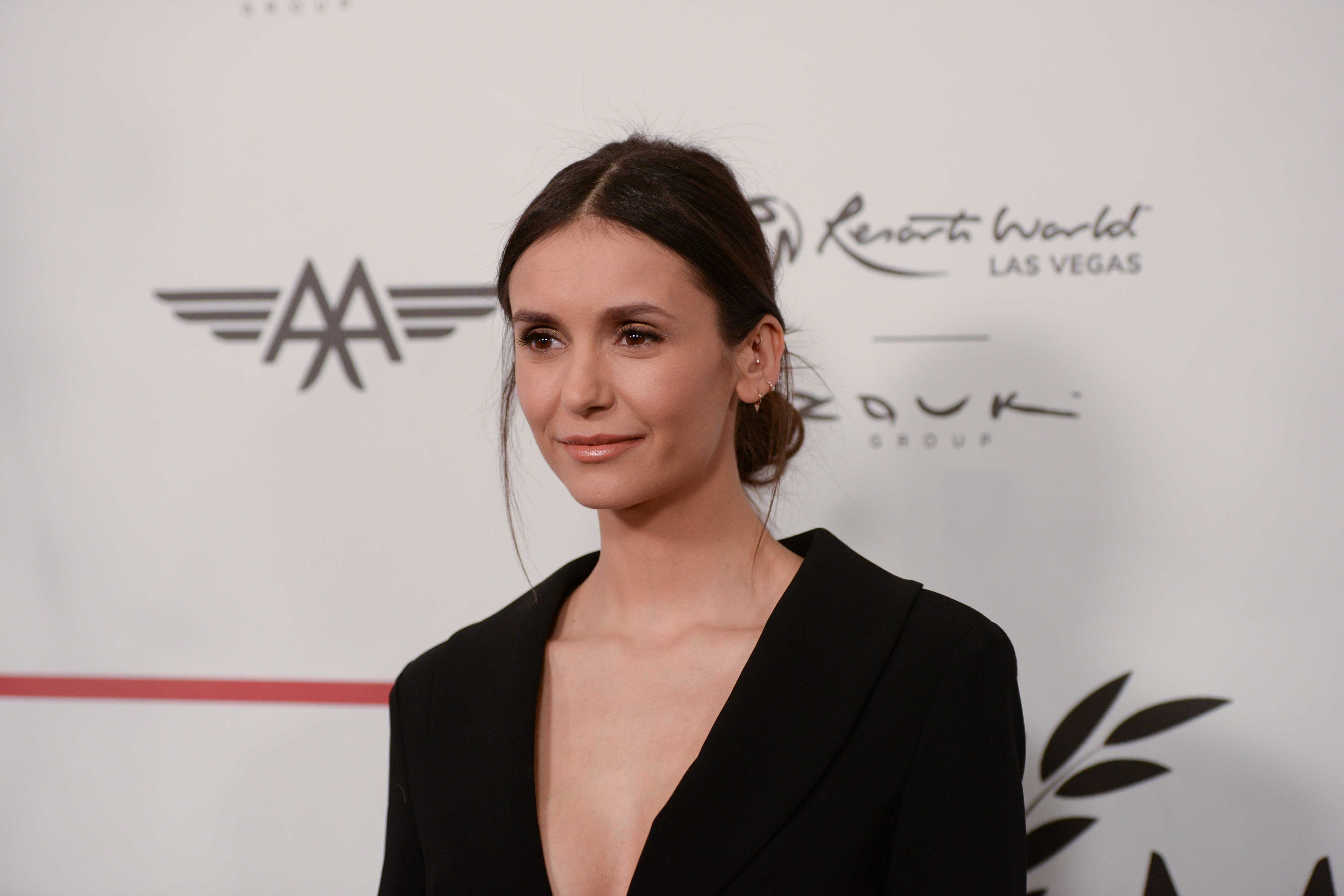 'The Vampire Diaries' star Nina Dobrev wears a black suit.