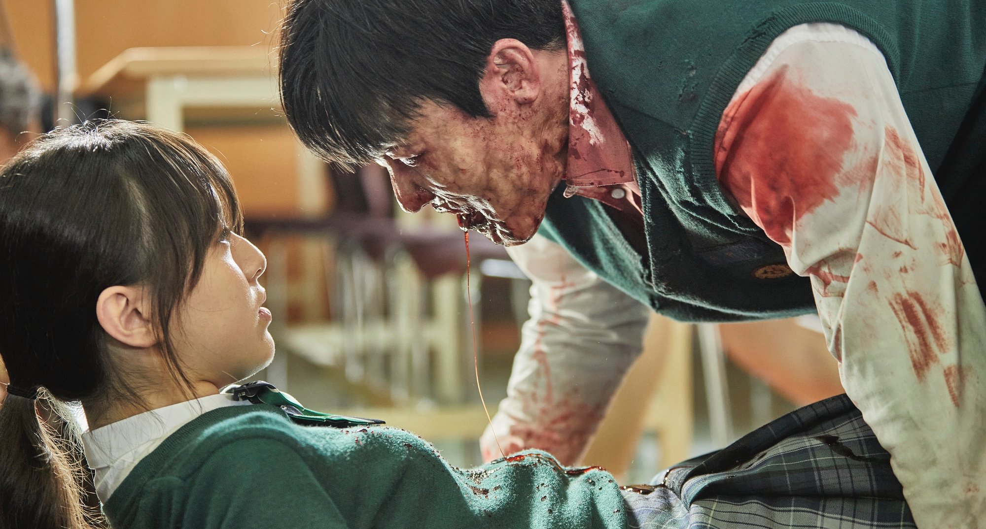 On-jo and male zombie in 'All of Us Are Dead' in cafeteria.