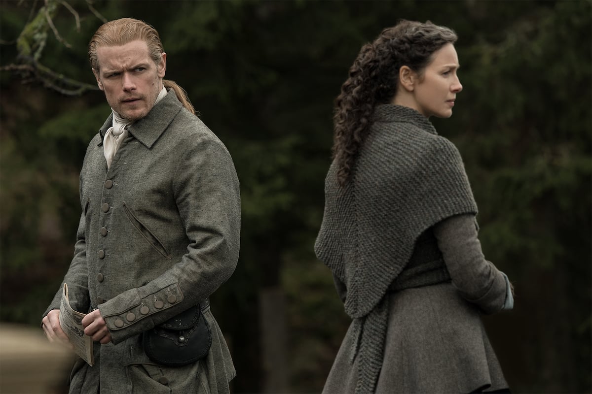 'Outlander' stars Sam Heughan and Caitriona Balfe stand back to back