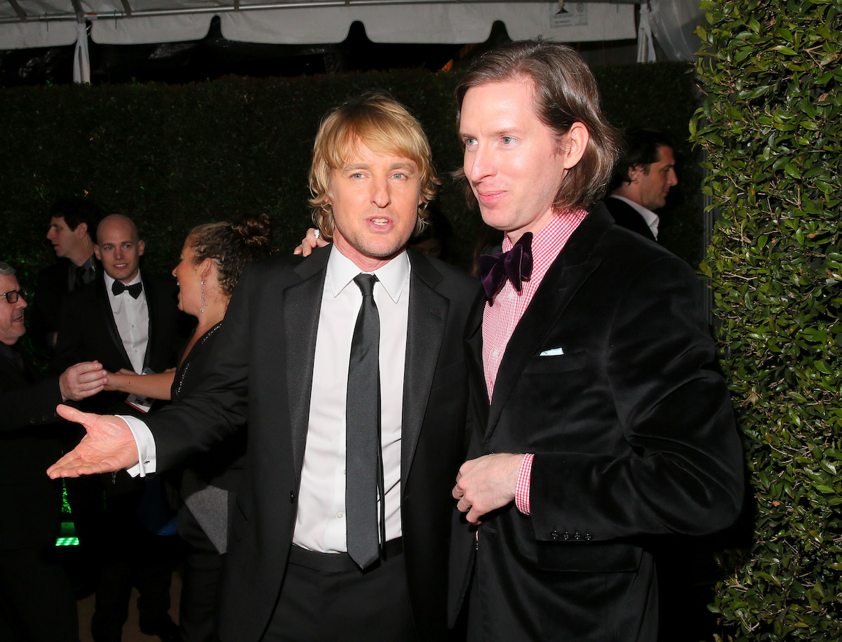 Actor Owen Wilson and director Wes Anderson chat after The 72nd Annual Golden Globe Awards in 2015