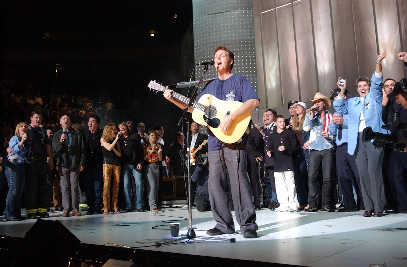 Paul McCartney wearing an FDNY T-shirt while performing during the Concert for New York in 2001.
