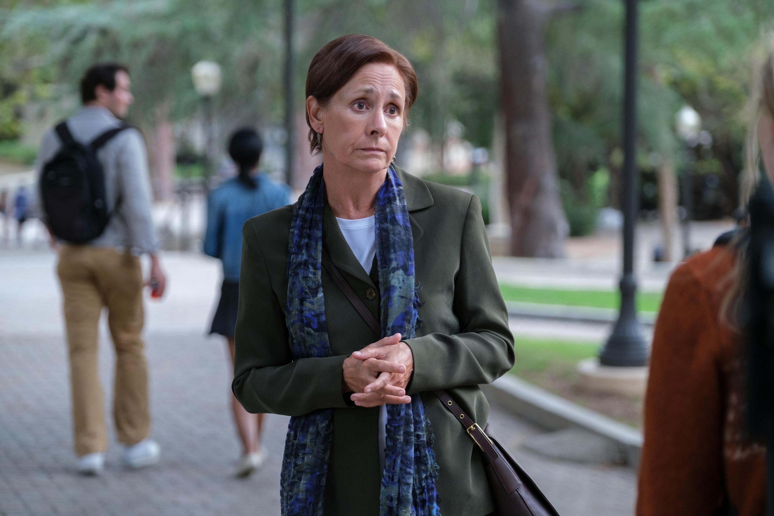 'The Dropout' cast Laurie Metcalf plays Phyllis Gardner with her hands folded.