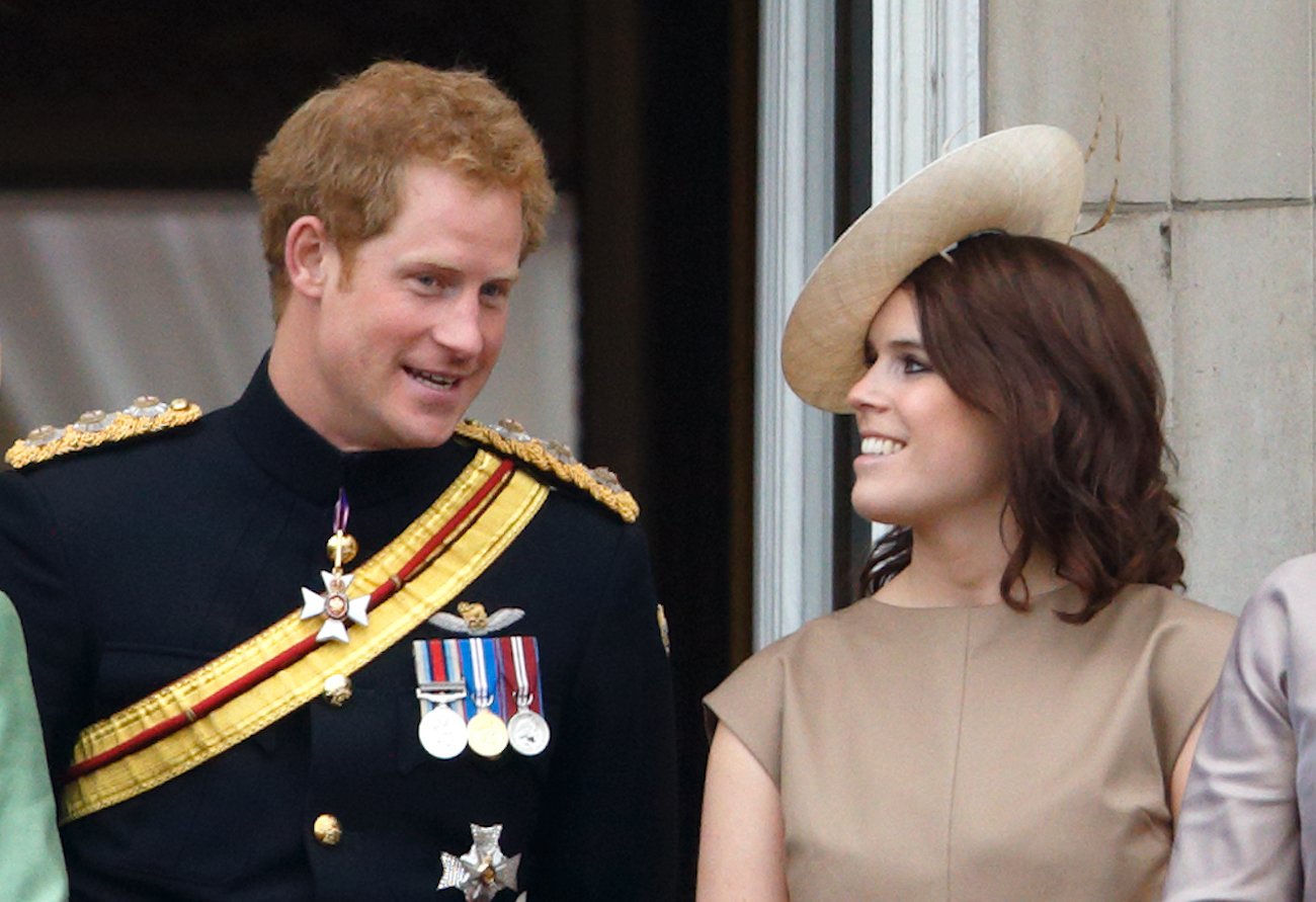 Prince Harry and Princess Eugenie smile at each other