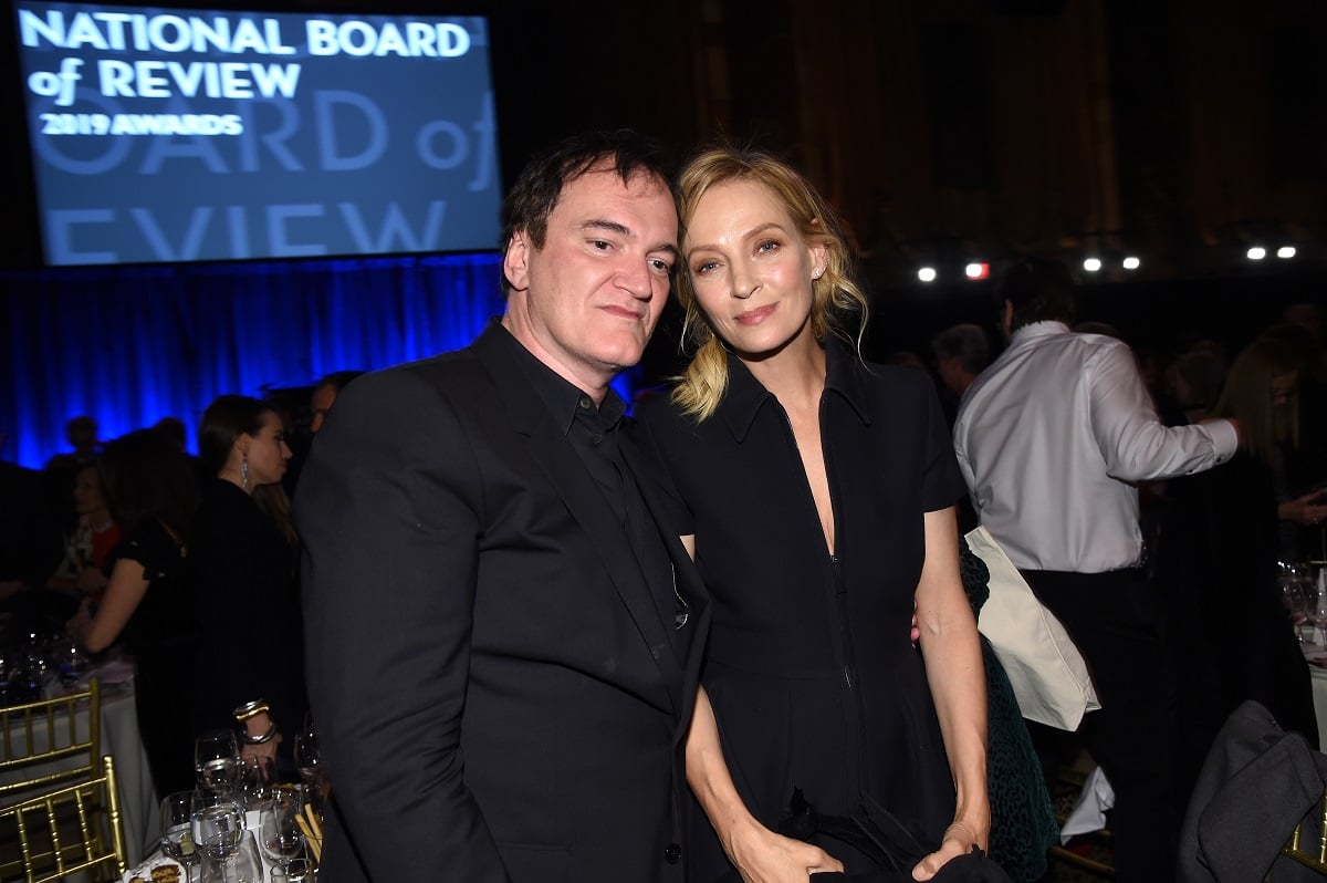 Quentin Tarantino smiling with Uma Thurman