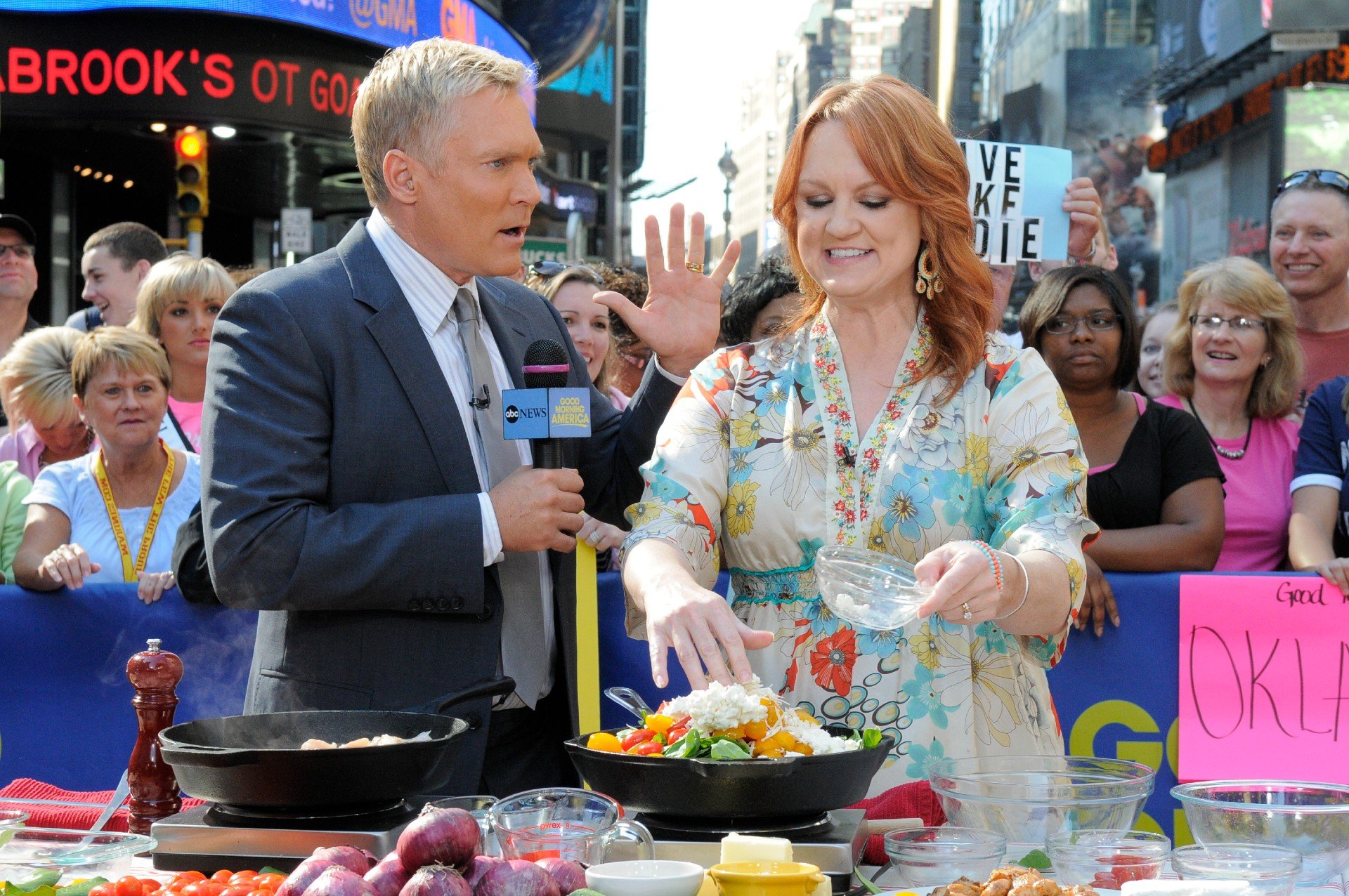 Sam Champion and Ree Drummond appear on Good Morning America during a cooking demonstration.