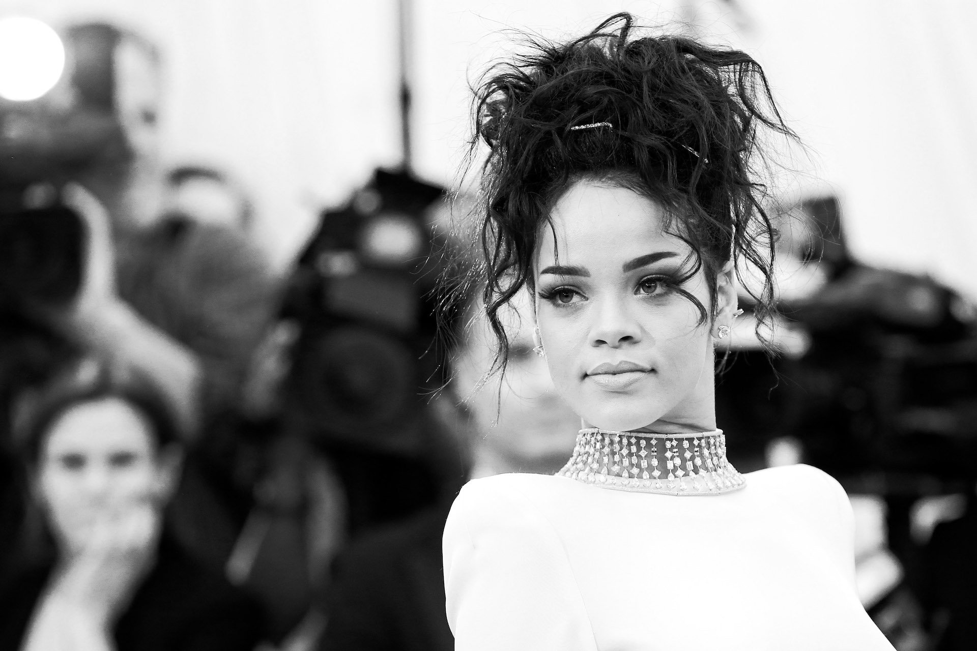 Rihanna poses on the red carpet