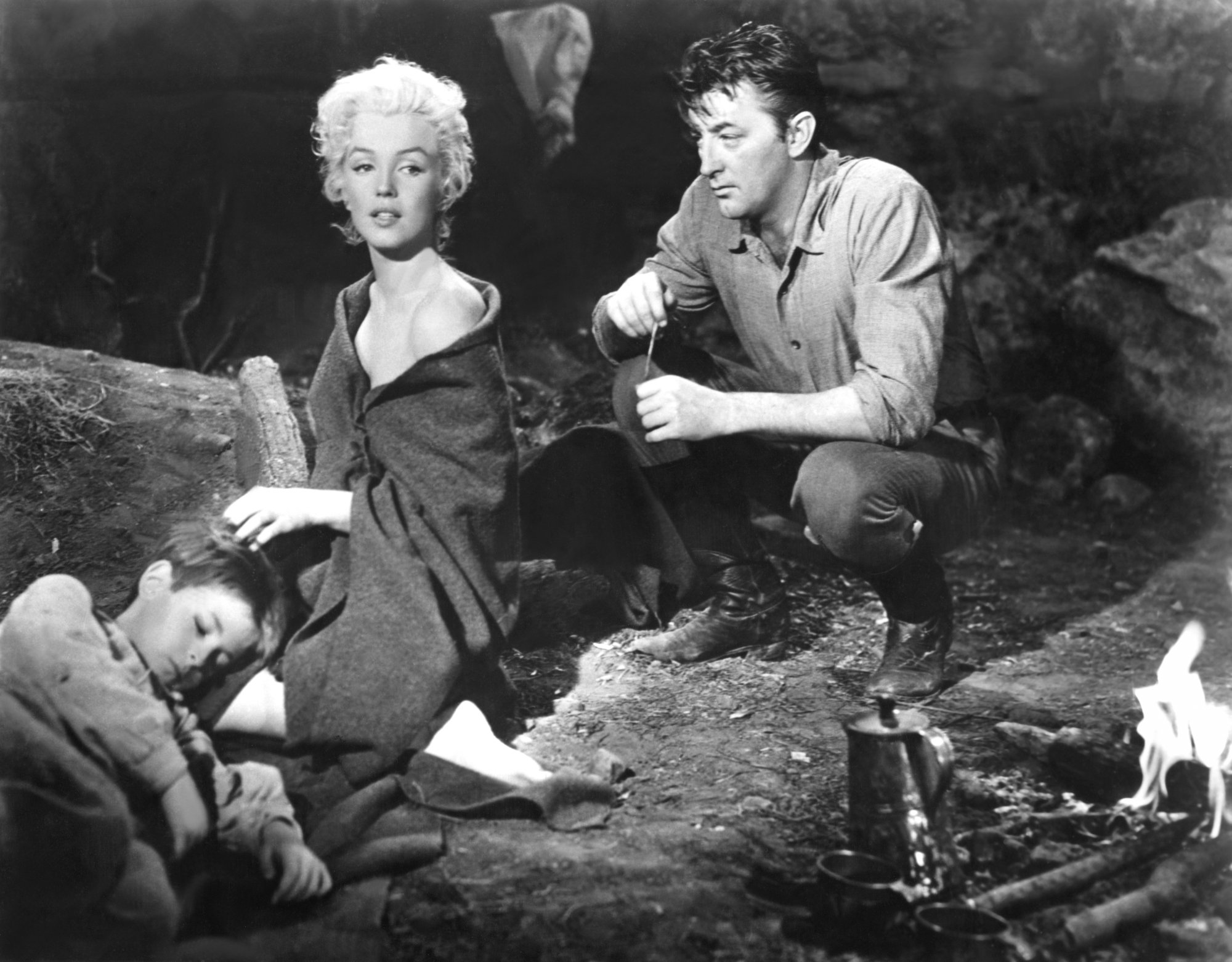 'River of No Return' Marilyn Monroe as Kay Weston and Robert Mitchum as Matt Calder in black-and-white sitting