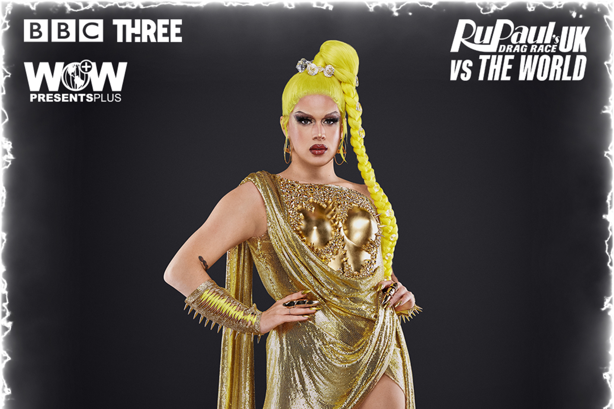 'RuPaul's Drag Race UK vs The World' Lemon wearing yellow and gold in promo image