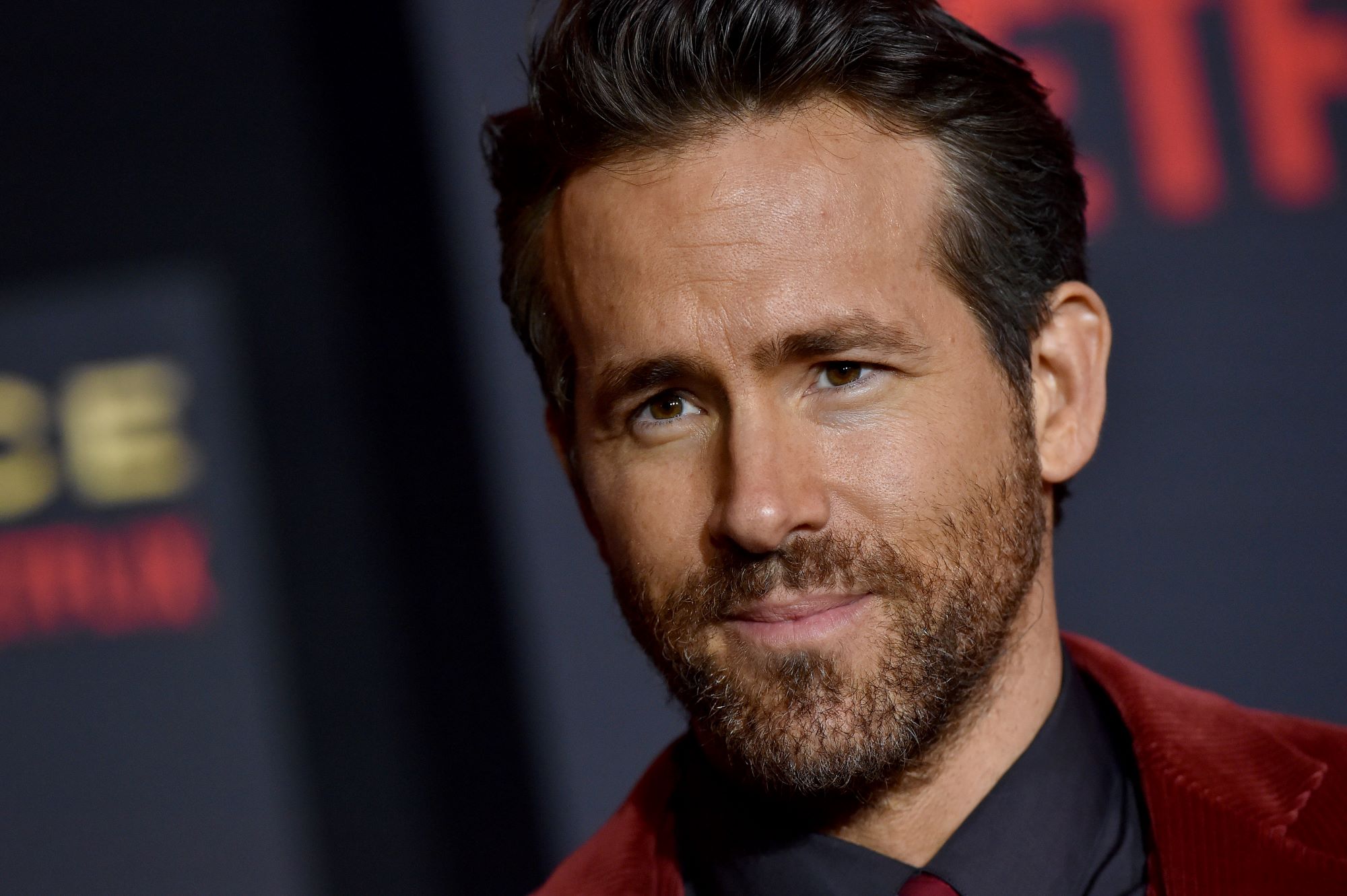 'Deadpool' star Ryan Reynolds, who denies he's in 'Doctor Strange in the Multiverse of Madness,' wears a red suit over