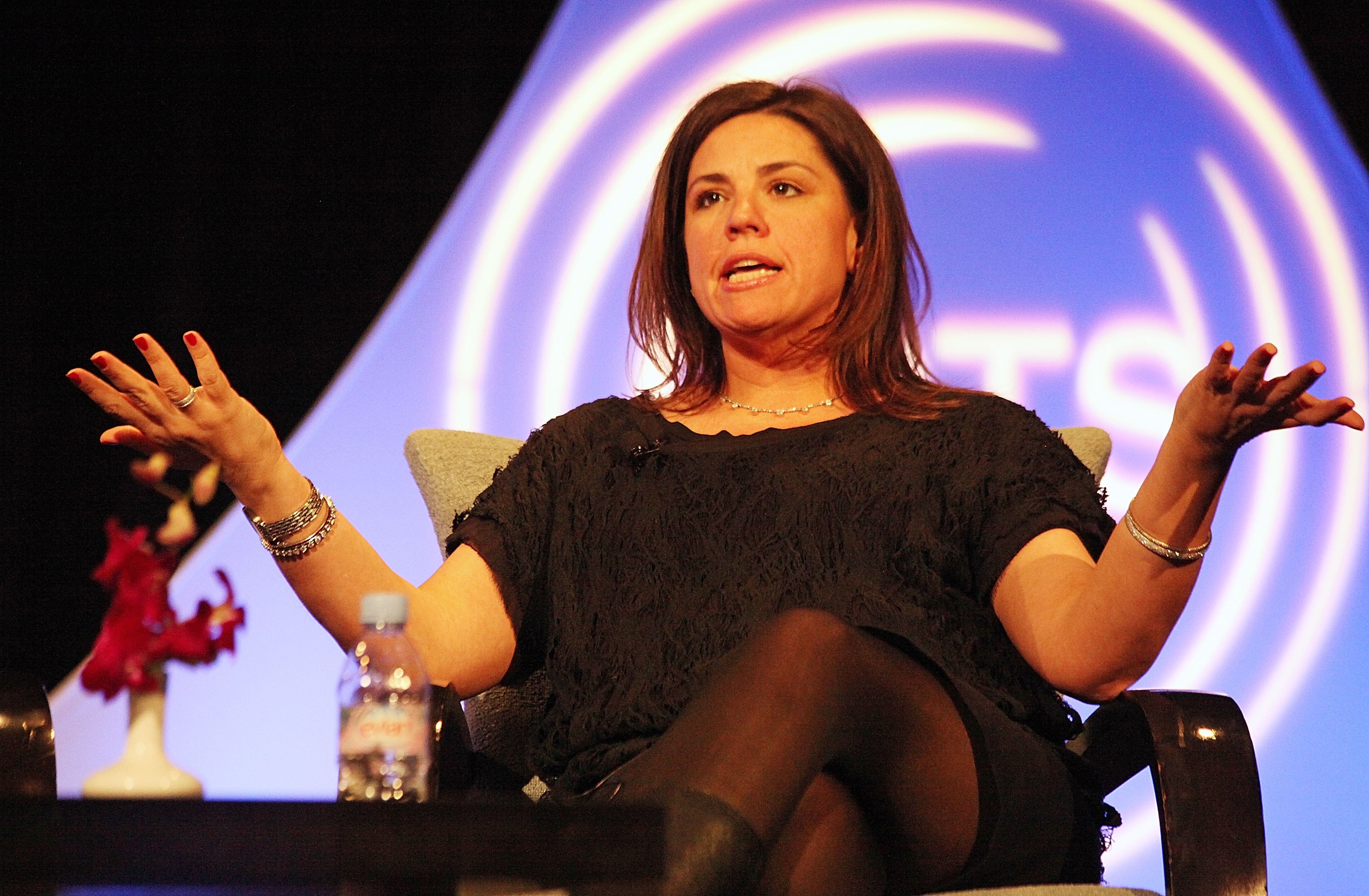 'Jersey Shore' producer SallyAnn Salsano raises her arms during a talk