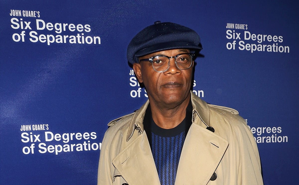 Samuel L. Jackson posing in a hat and coat.