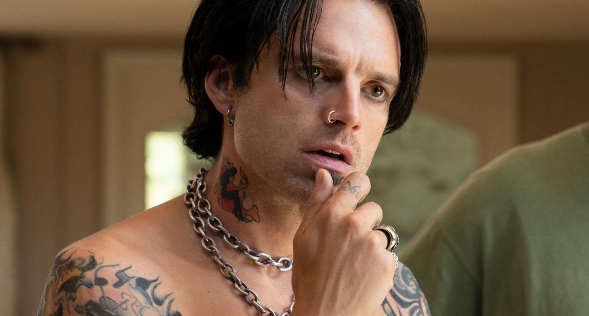 Sebastian Stan as Tommy Lee in 'Pam & Tommy' Hulu series shirtless with tattoos.