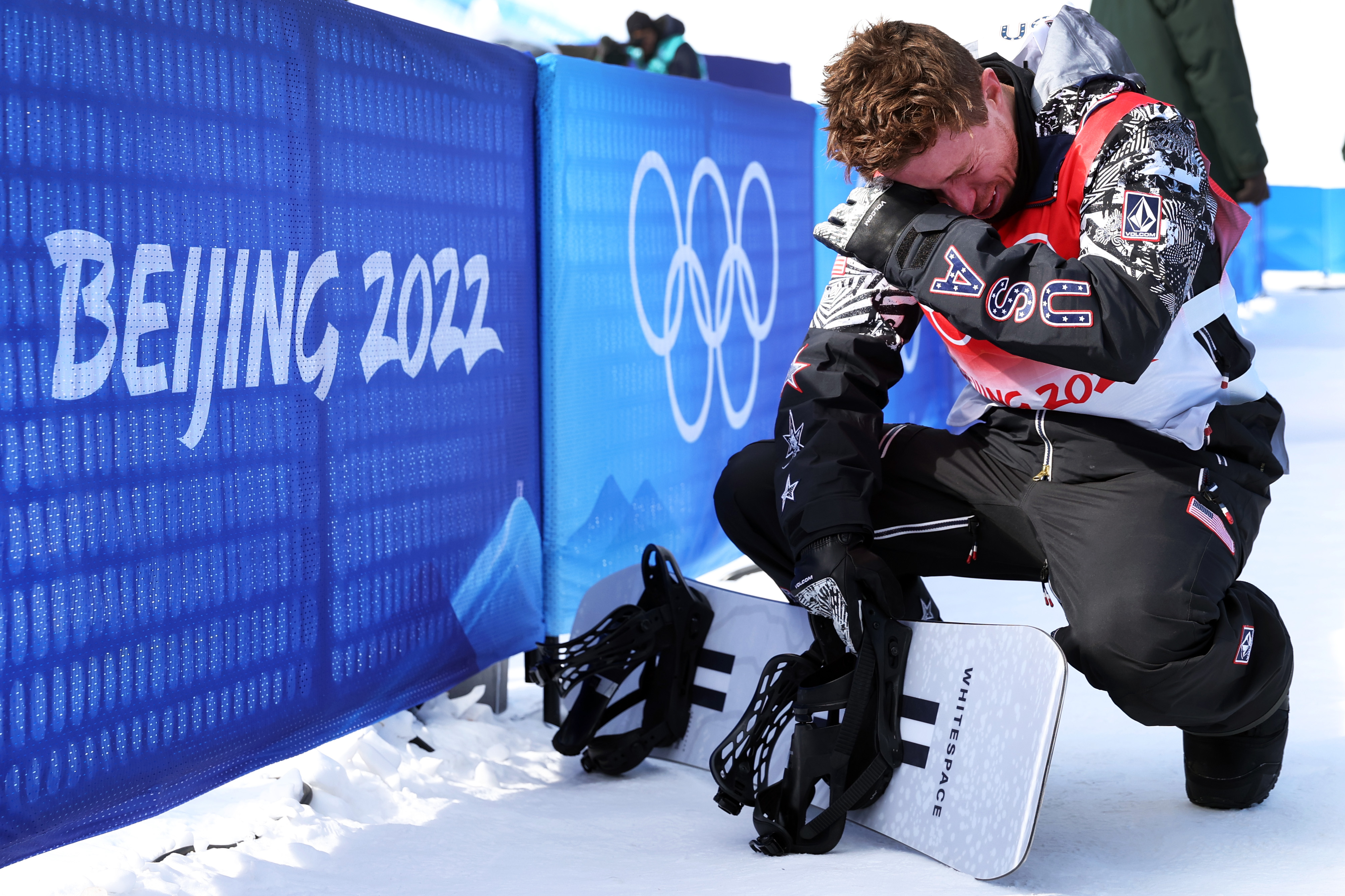Shaun White becomes emotional after finishing fourth during the Men's Snowboard Halfpipe