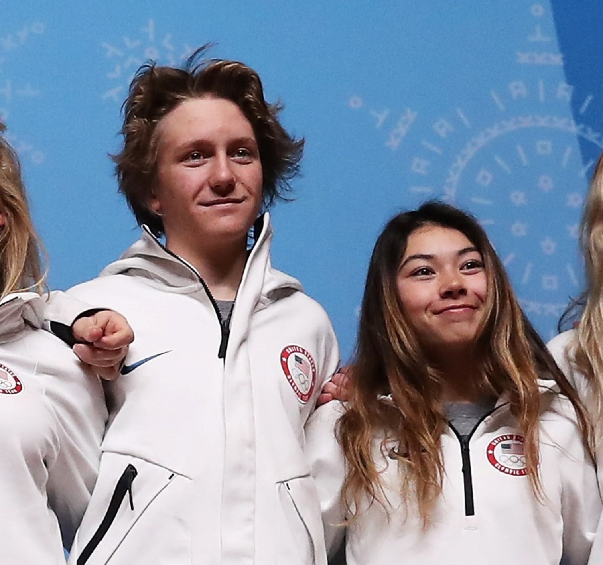 Snowboarding couple Red Gerard and Hailey Langland pose for a photo while attending a press conference