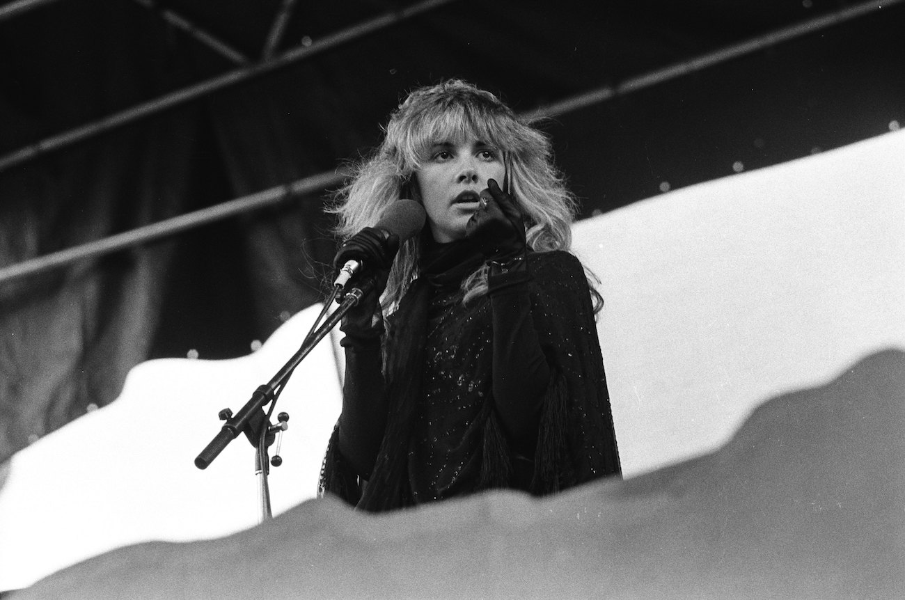 Stevie Nicks dressed in black while performing with Fleetwood Mac in California, 1977.