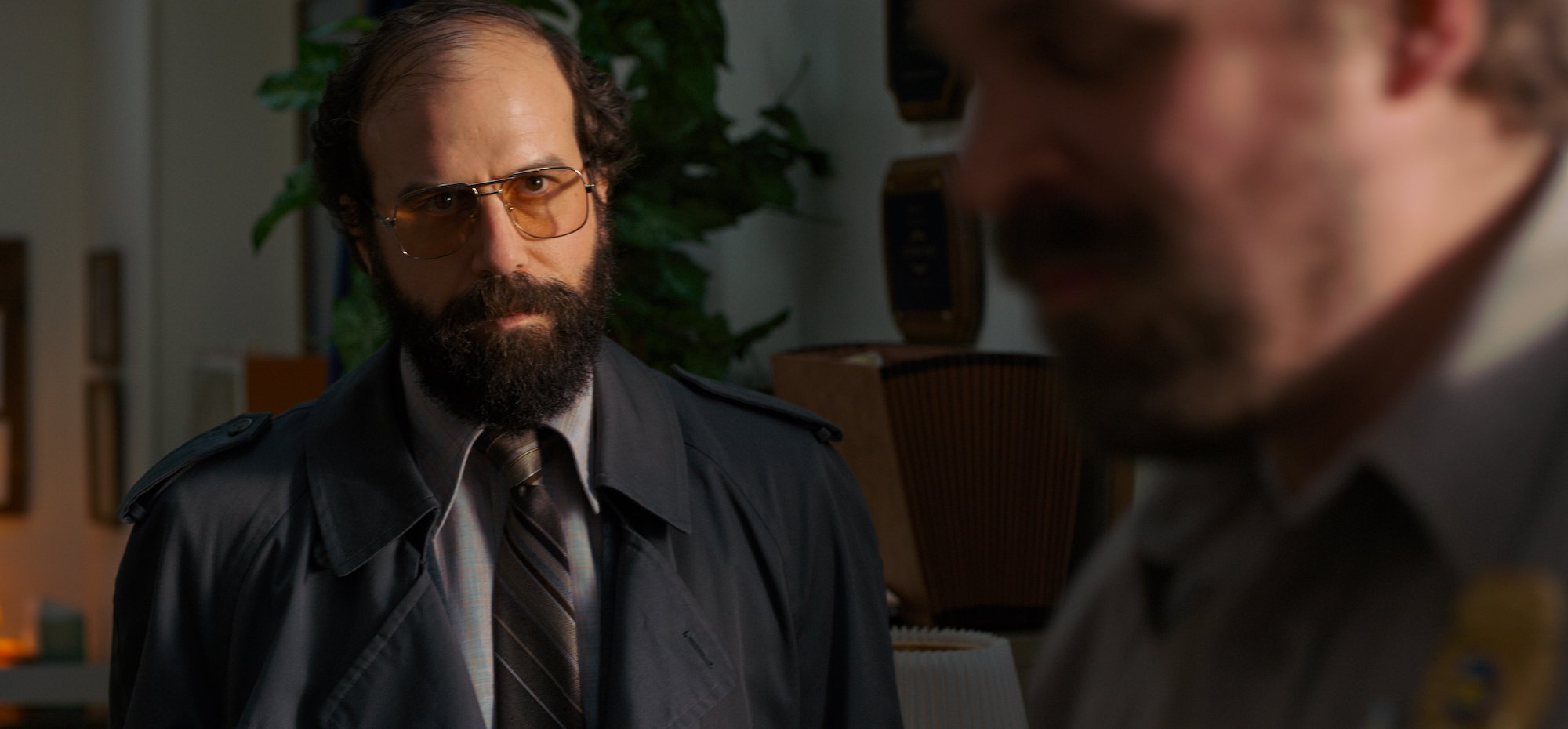 'Stranger Things 4' character Murray Bauman wearing a tie in a production still.