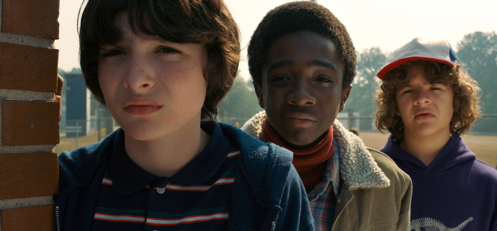 'Stranger Things' stars Finn Wolfhard, Caleb McLaughlin, and Gaten Matarazzo look around a corner