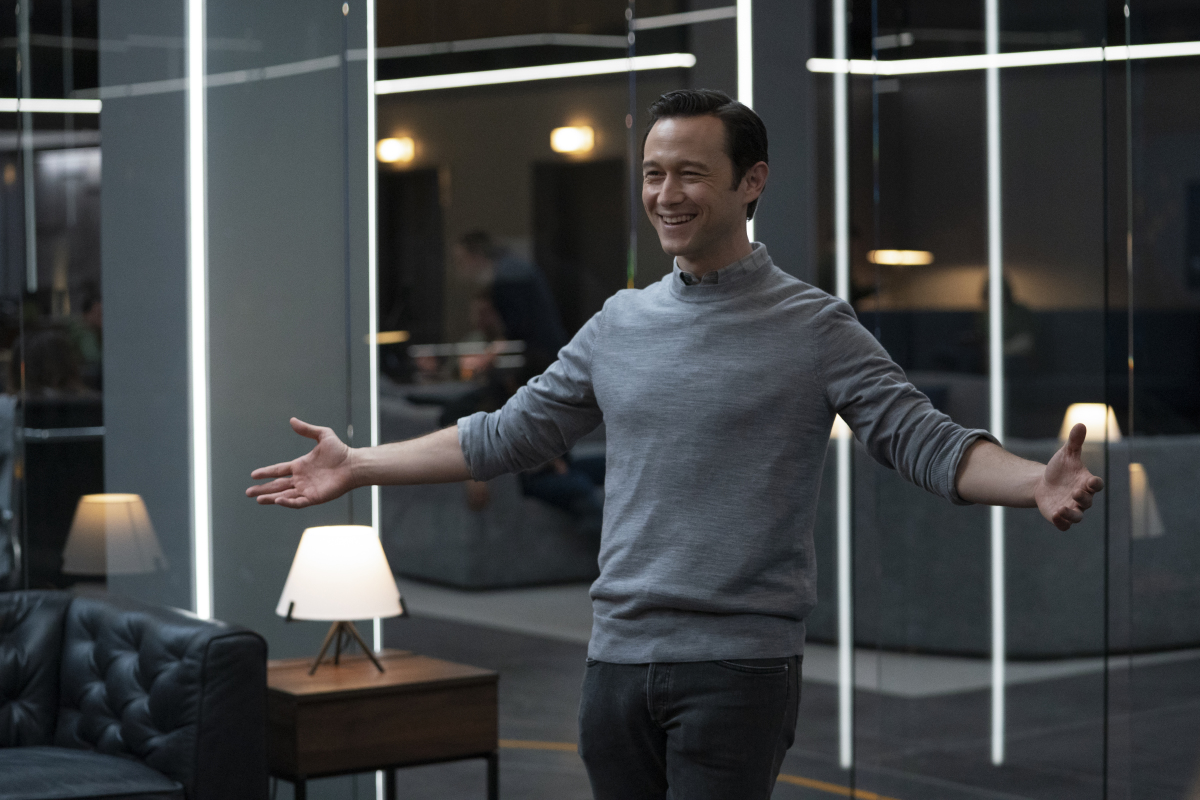 In a scene from 'Super Pumped,' Uber CEO Travis Kalanick (Joseph Gordon-Levitt) opens his arms wide in a boardroom