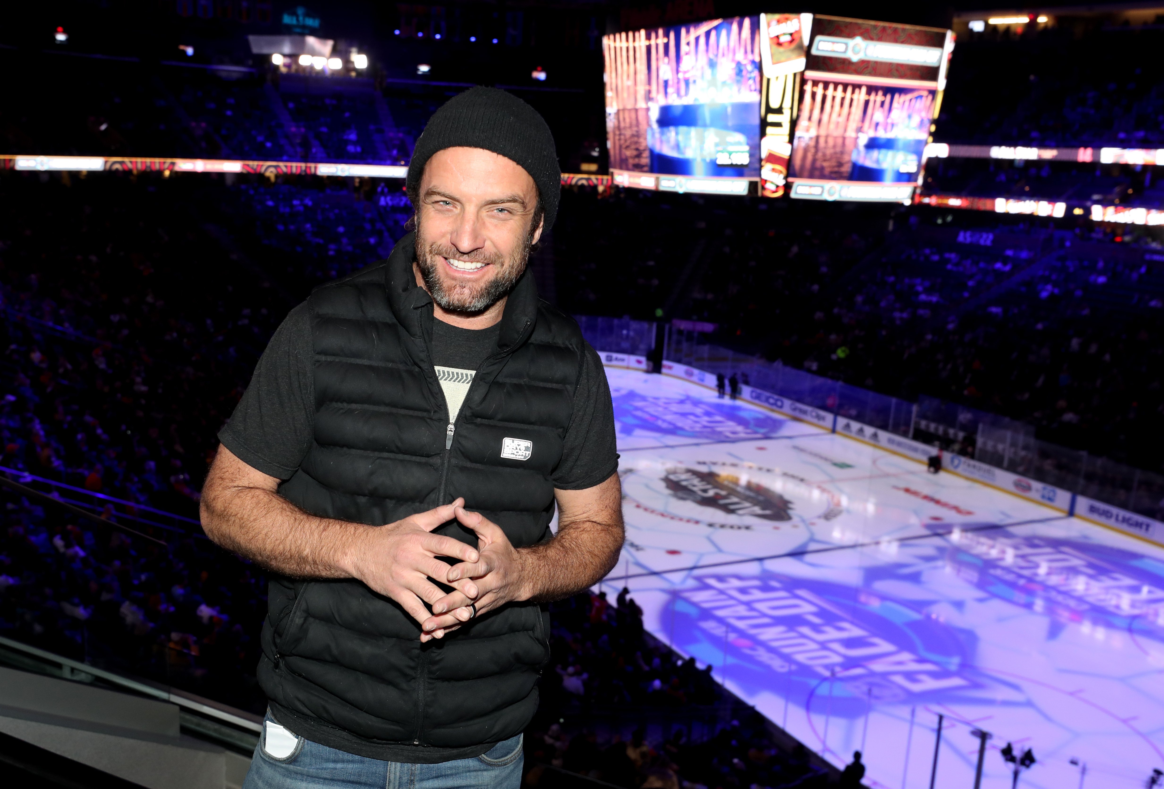 T.J. Lavin smiling inside the arena at the 2022 NHL All-Star Skills