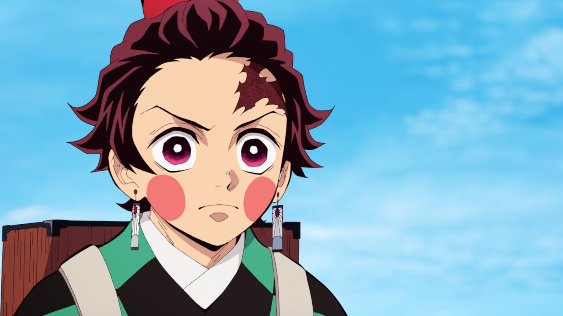 Tanjiro wearing makeup for his undercover mission in 'Demon Slayer' Season 2's Entertainment District Arc