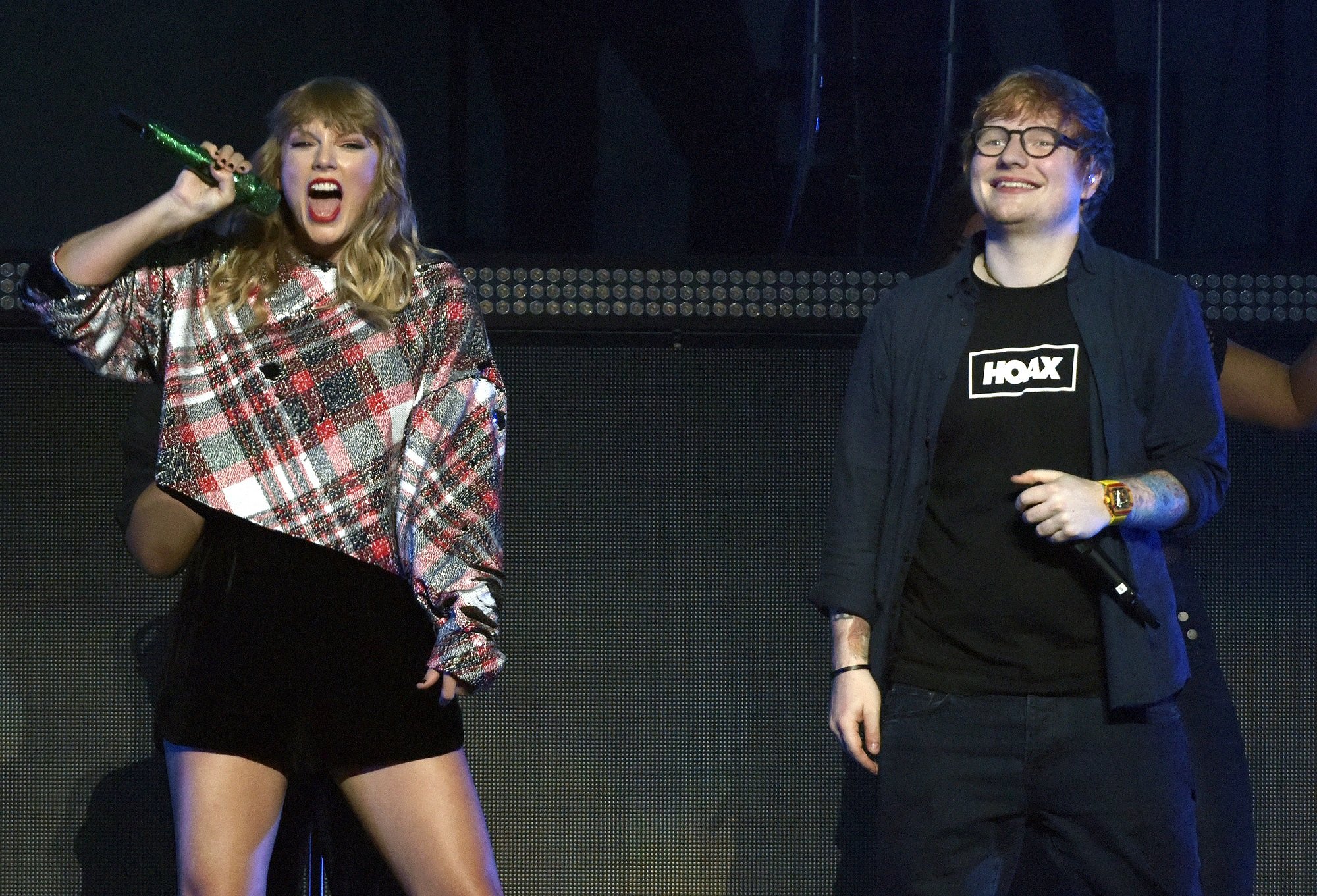 Taylor Swift and Ed Sheeran perform onstage during 99.7 NOW! POPTOPIA