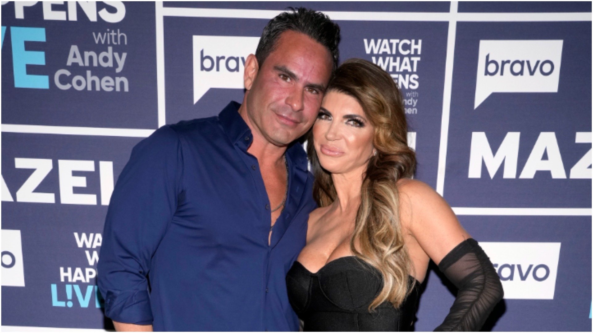 Luis Ruelas, Teresa Giudice from 'RHONJ' pose for a photo at 'WWHL'
