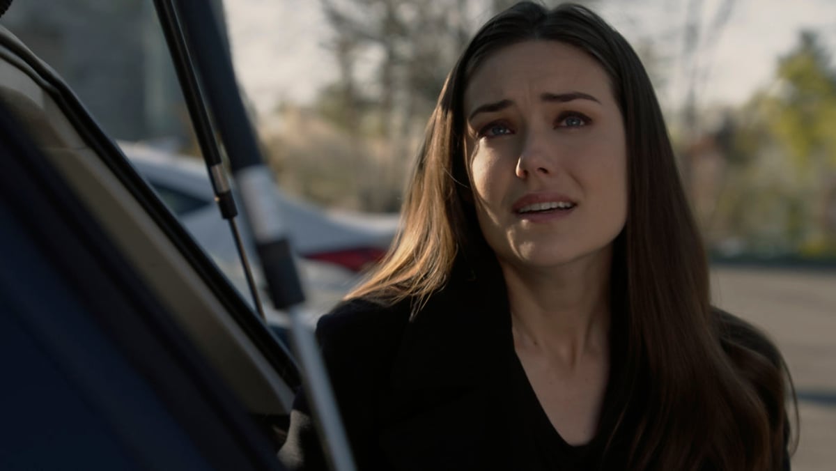 Megan Boone as Liz Keen wearing a black top. Will Boone return in The Blacklist Season 9?