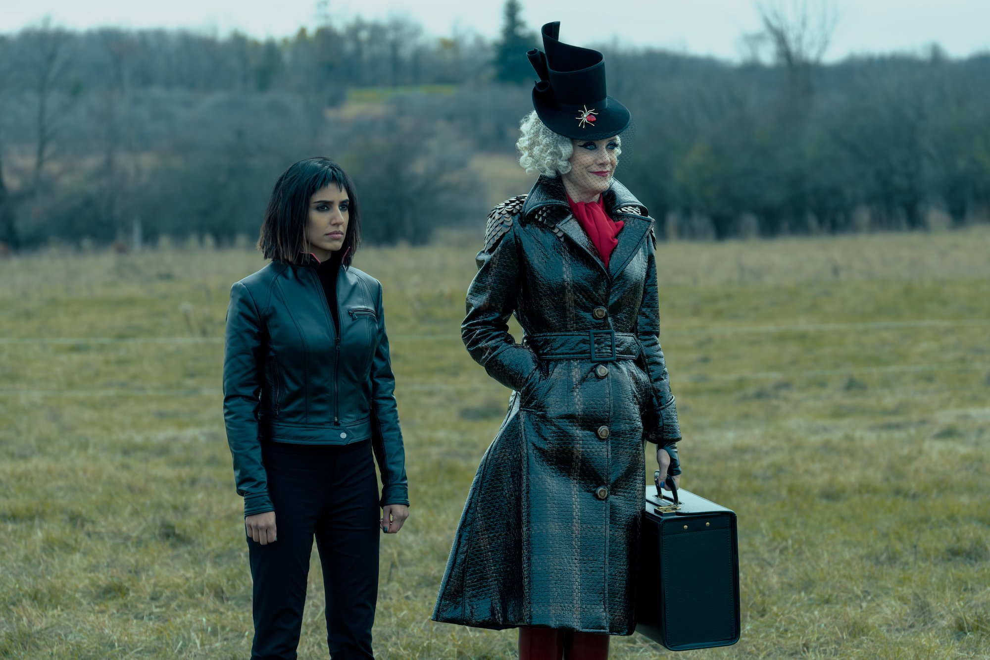 Lila and The Handler stand in a field in the finale of 'The Umbrella Academy' Season 2. Recent images show Lila joining the rest of the Hargreeves in 'The Umbrella Academy' Season 3.