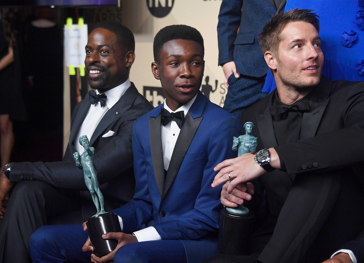 Actors Sterling K. Brown, Niles Fitch, and Justin Hartley, winners of Outstanding Performance by an Ensemble in a Drama Series for 'This Is Us,' pose in the press room at the 24th Annual Screen Actors Guild Awards