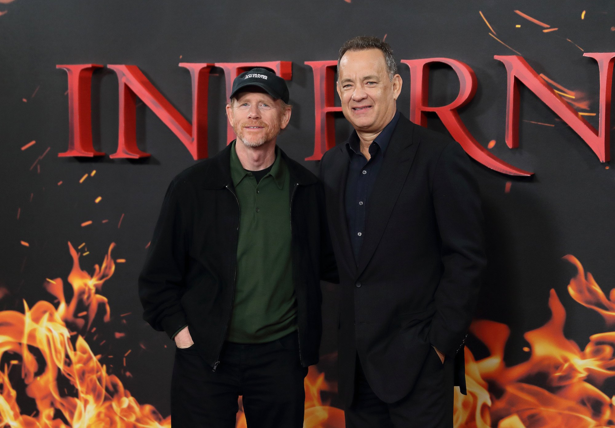 Tom Hanks and Ron Howard stand together on the 'Inferno' red carpet