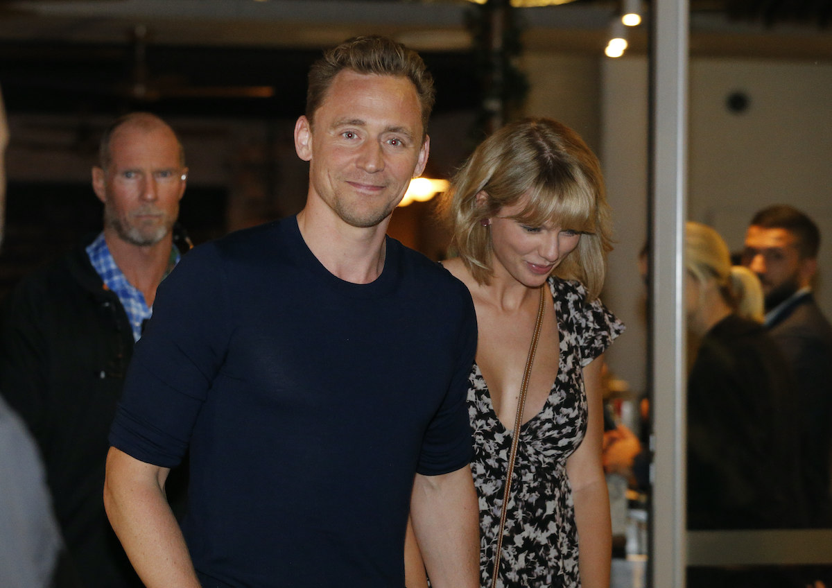 Tom Hiddleston and Taylor Swift smiling