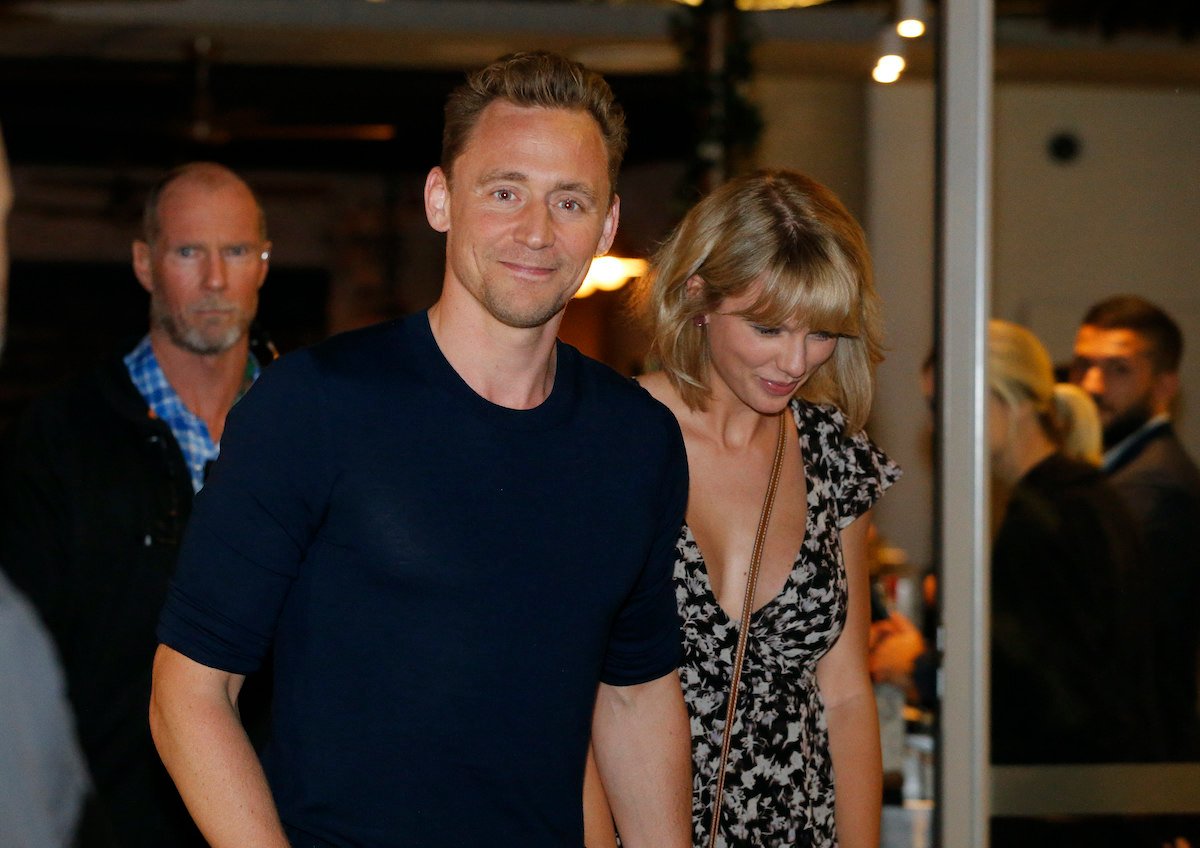 Tom Hiddleston and Taylor Swift smiling