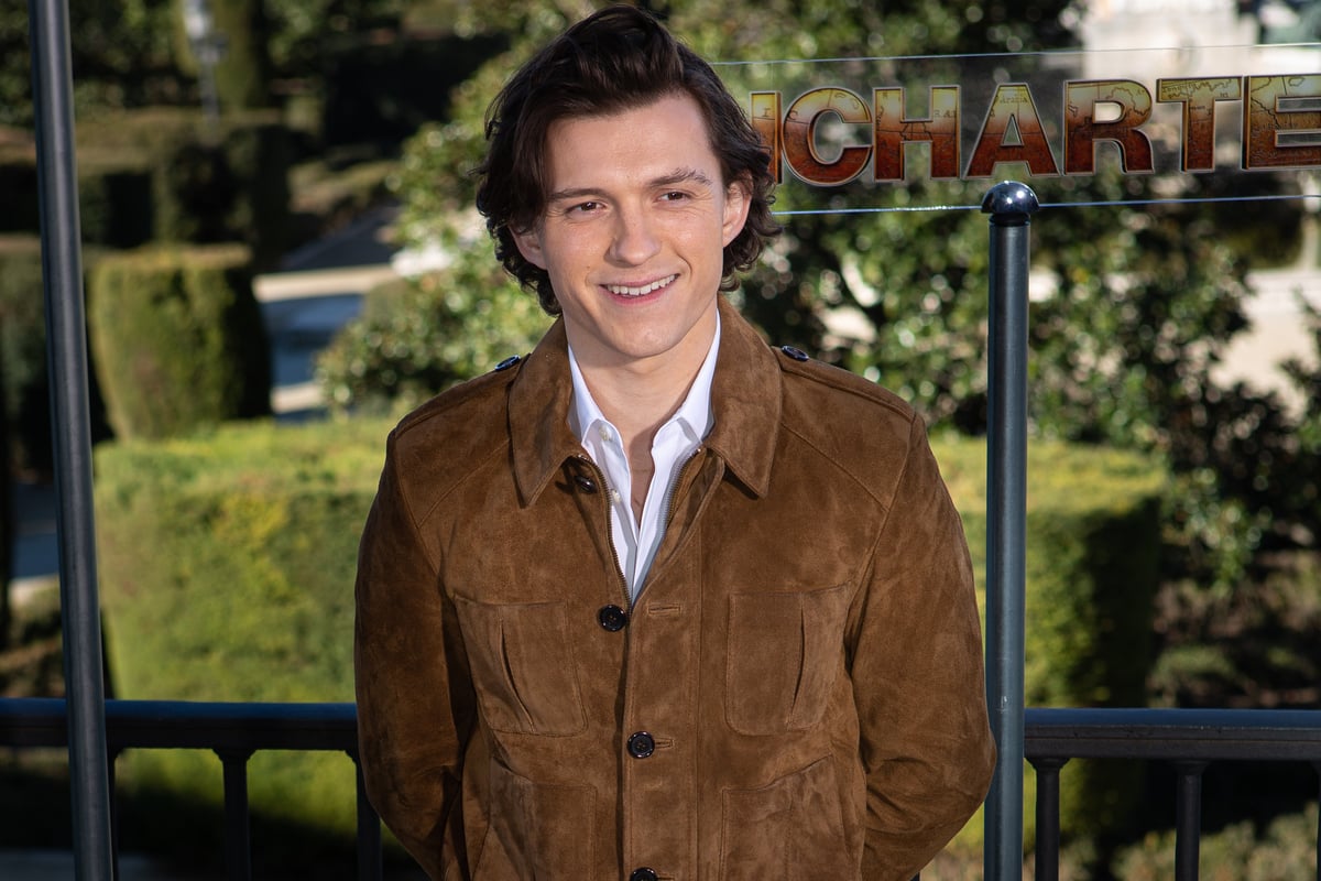 Young Nathan Drake actor Tom Holland revealed a cut 'Uncharted 4' scene, scene here for a photocall