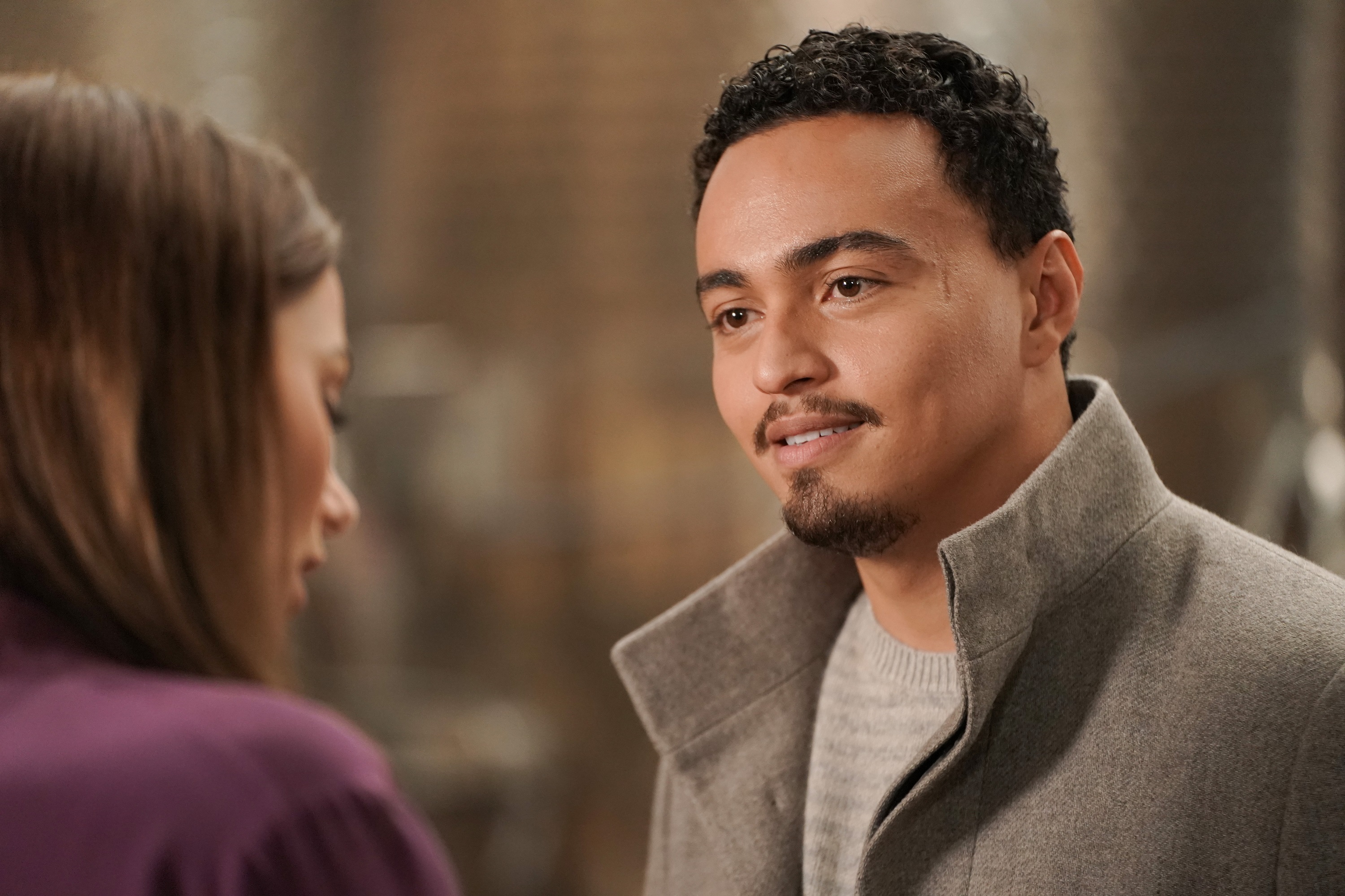 Tonatiuh portrays Antonio Sandoval in 'Promised Land' as he talks to Christina Ochoa