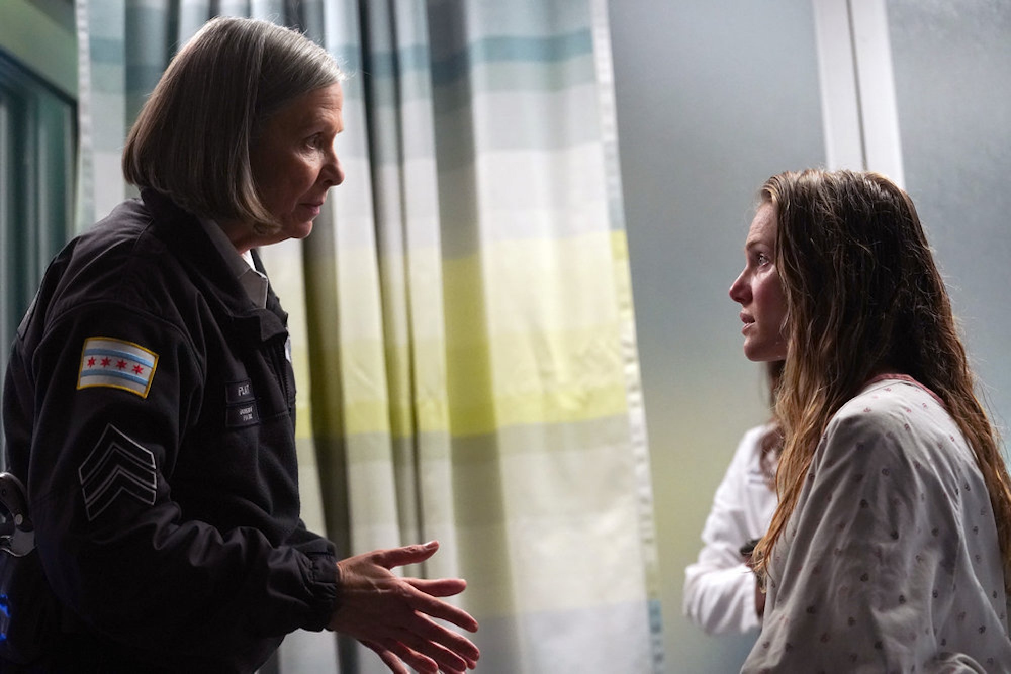 Trudy Platt talking to Hailey Upton in the hospital in 'Chicago P.D.' Season 9 Episode 13