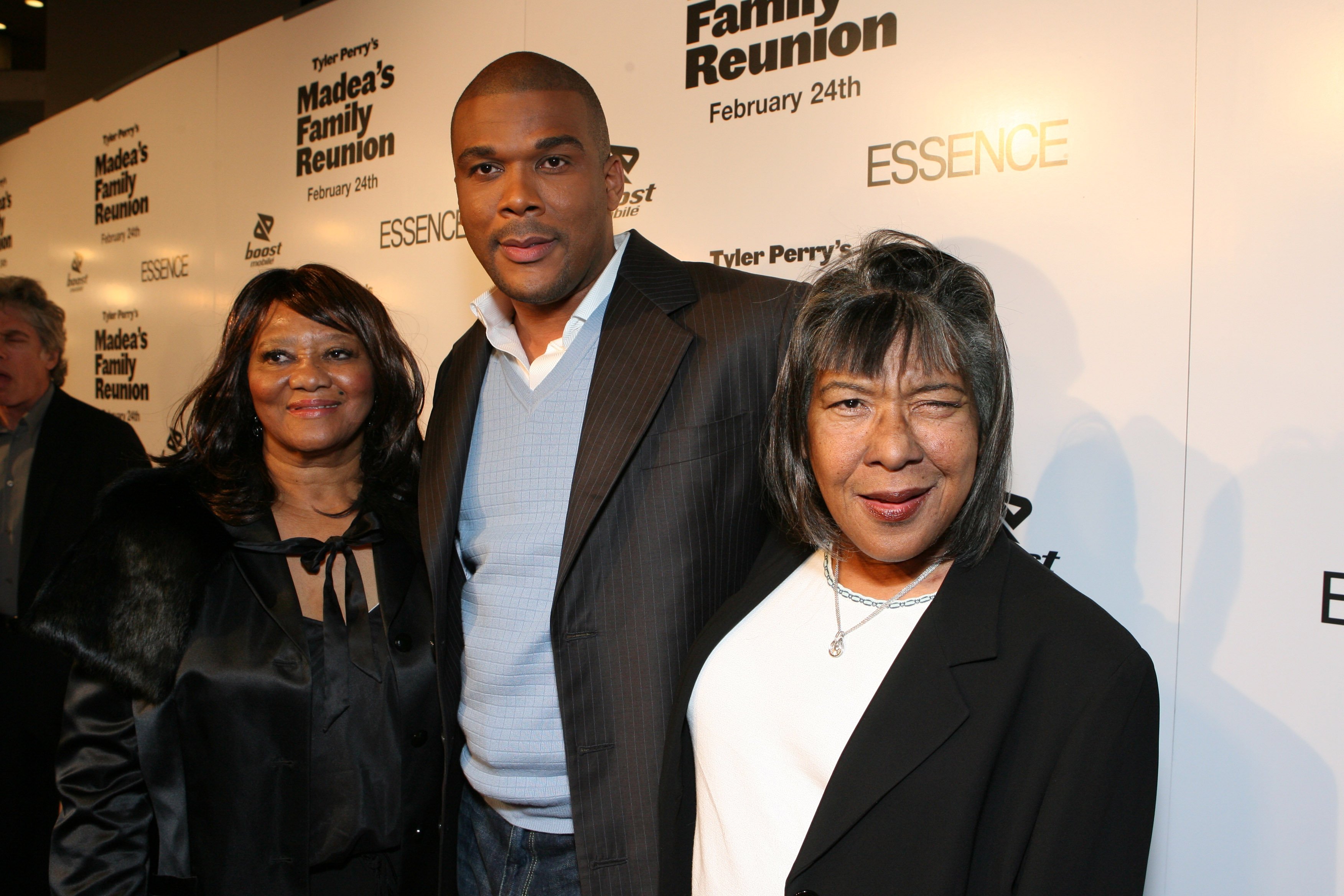Tyler Perry poses for a photo on the red carpet with Aunt Mayola and Mother Maxine