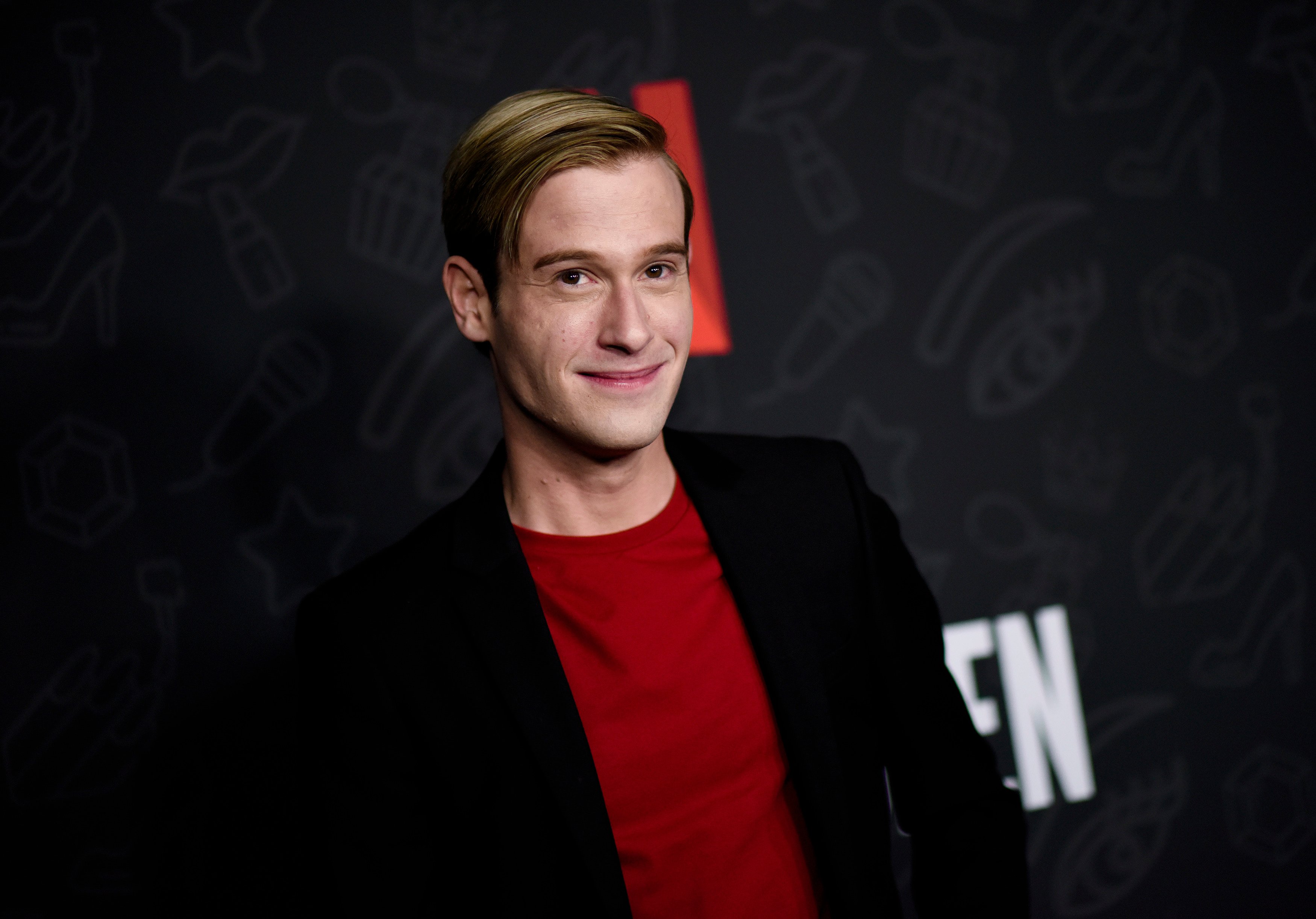 Tyler Henry of 'Hollywood Medium' and 'Life After Death' on the red carpet at the premiere of Netflix's 'AJ and the Queen'