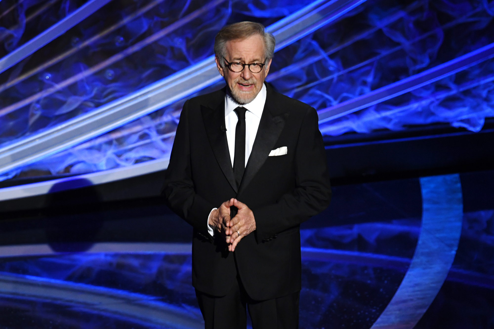 'West Side Story' Oscars 2022 nominee Steven Spielberg standing in a suit