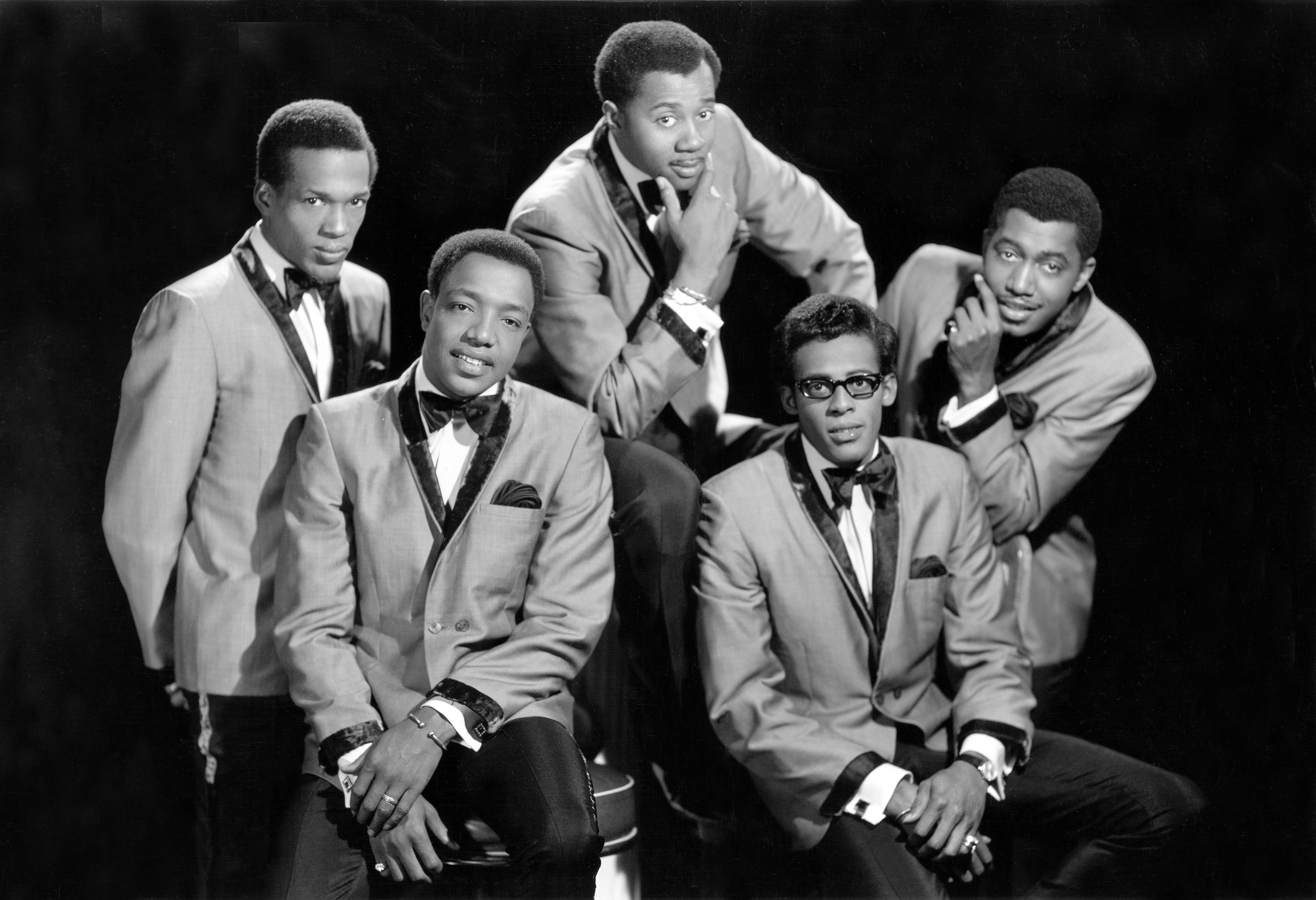 The Temptations wearing suits