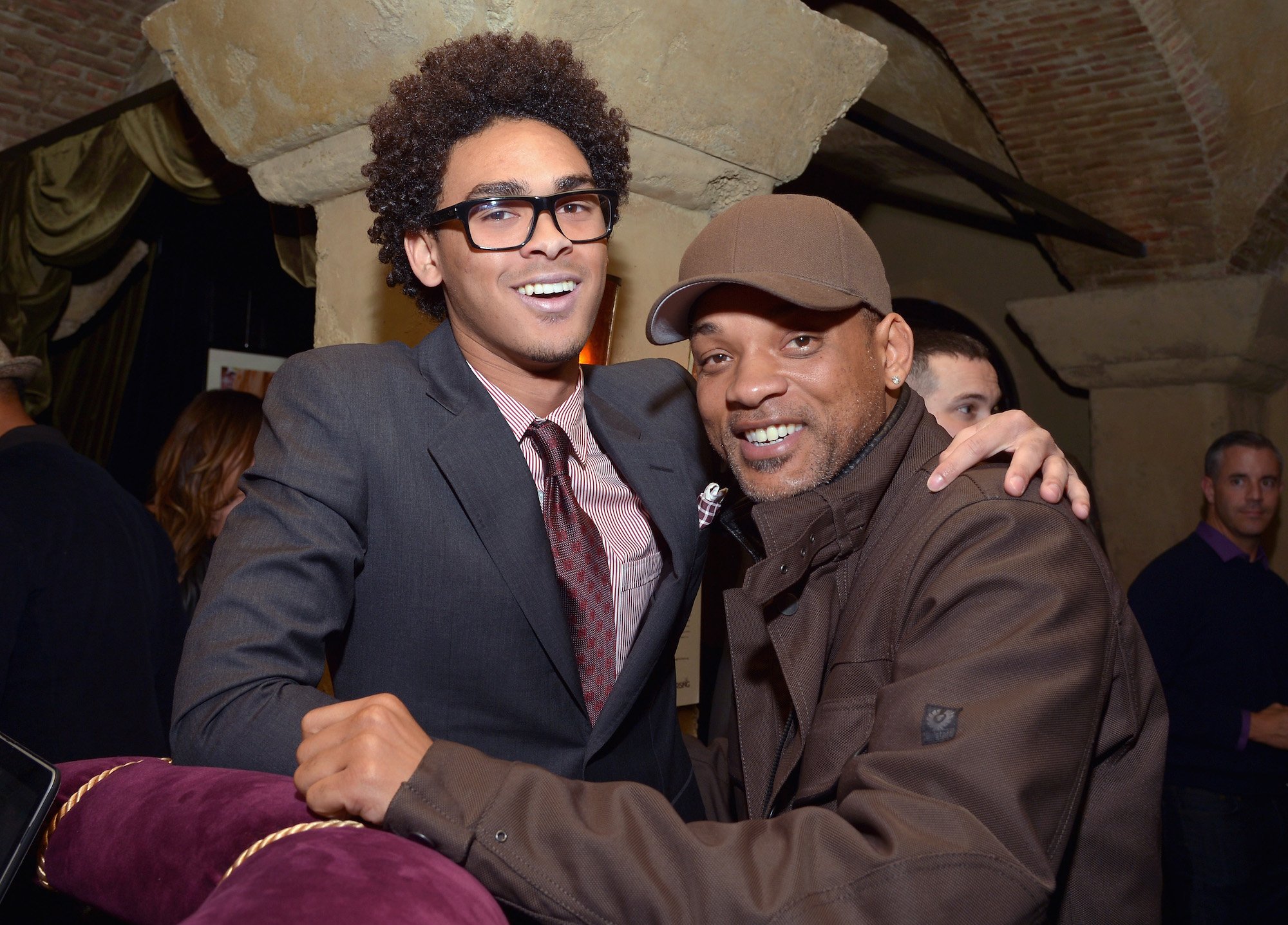 Will Smith's son Trey Smith puts his arm around his father