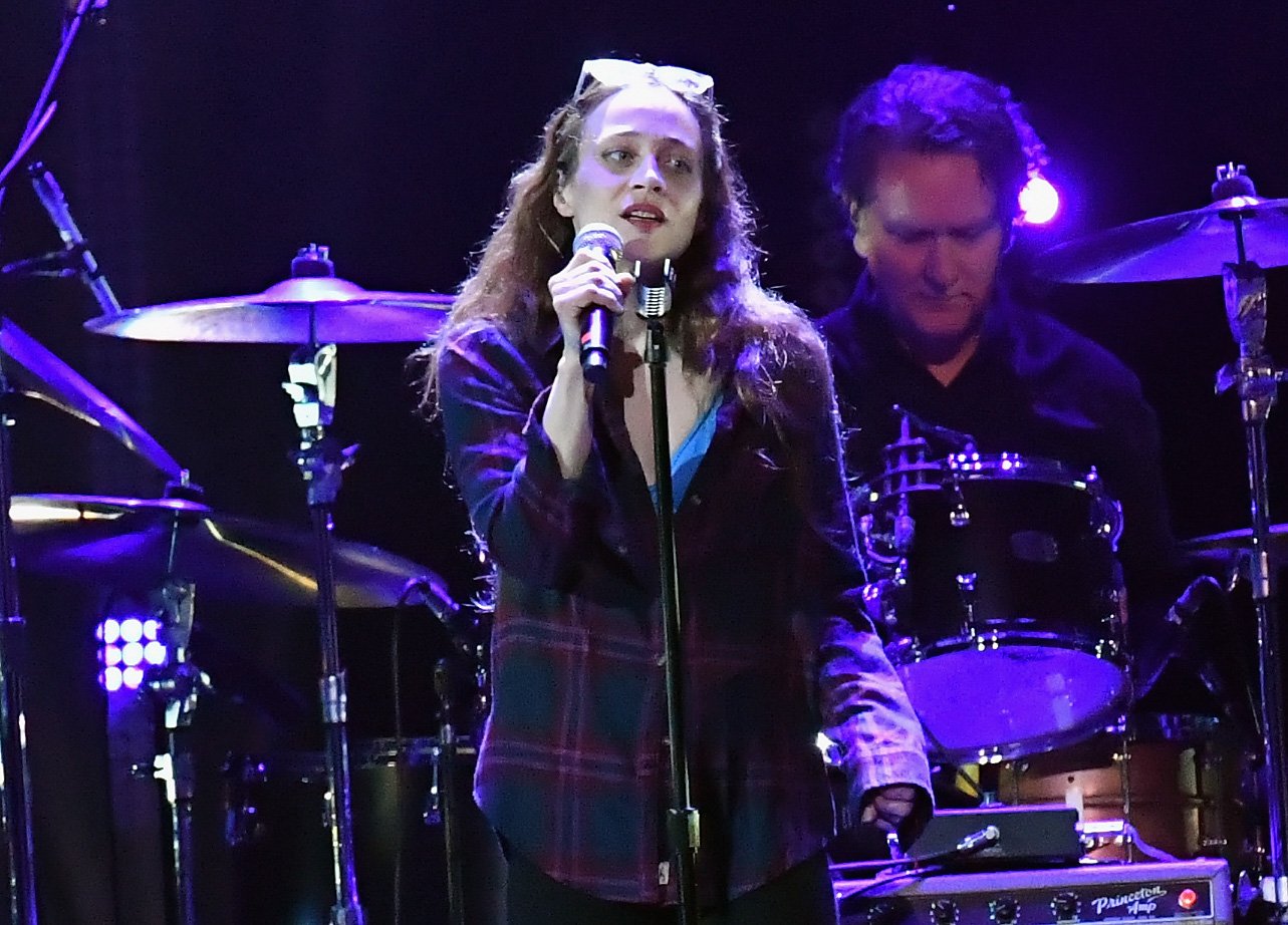 Fiona Apple with a microphone