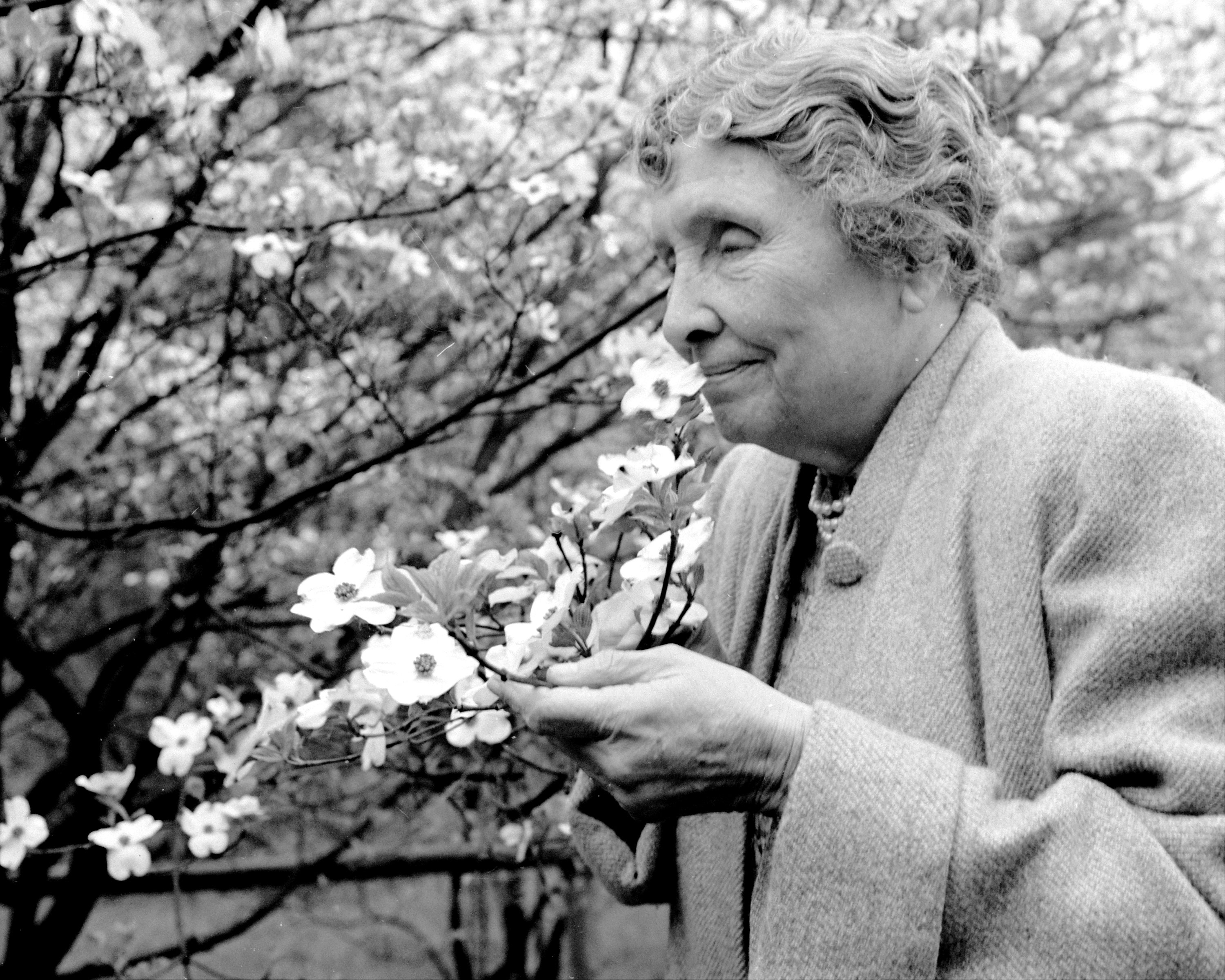 Helen Keller with flowers