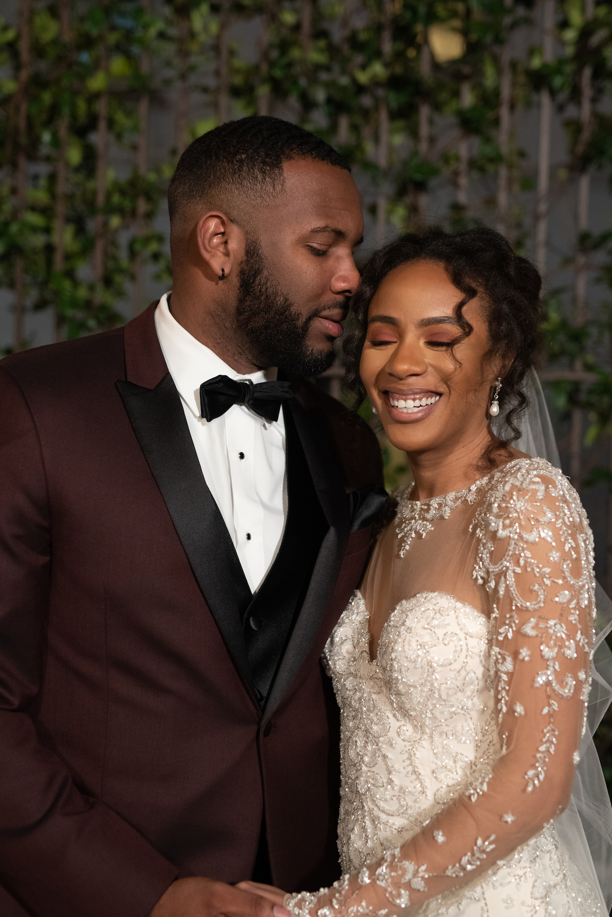 Miles and Karen pose for their wedding photo