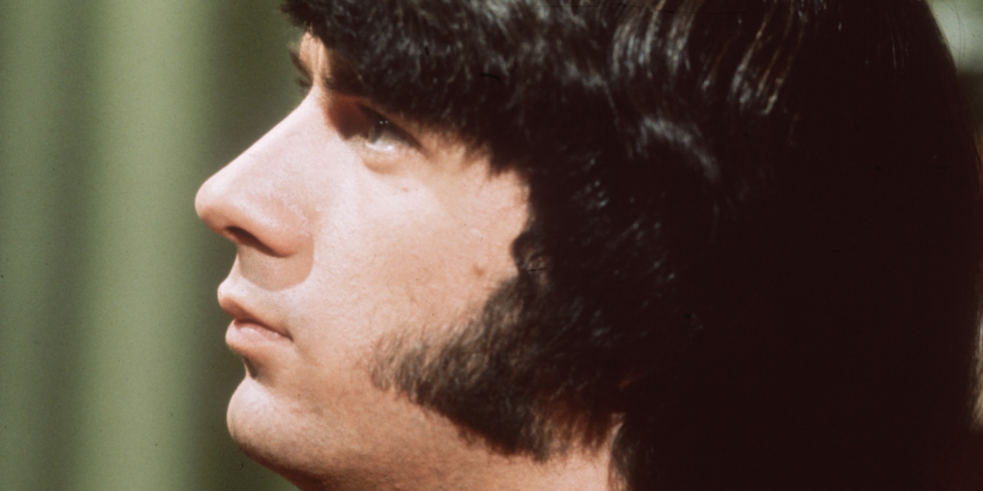 mike nesmith looks away from the camera