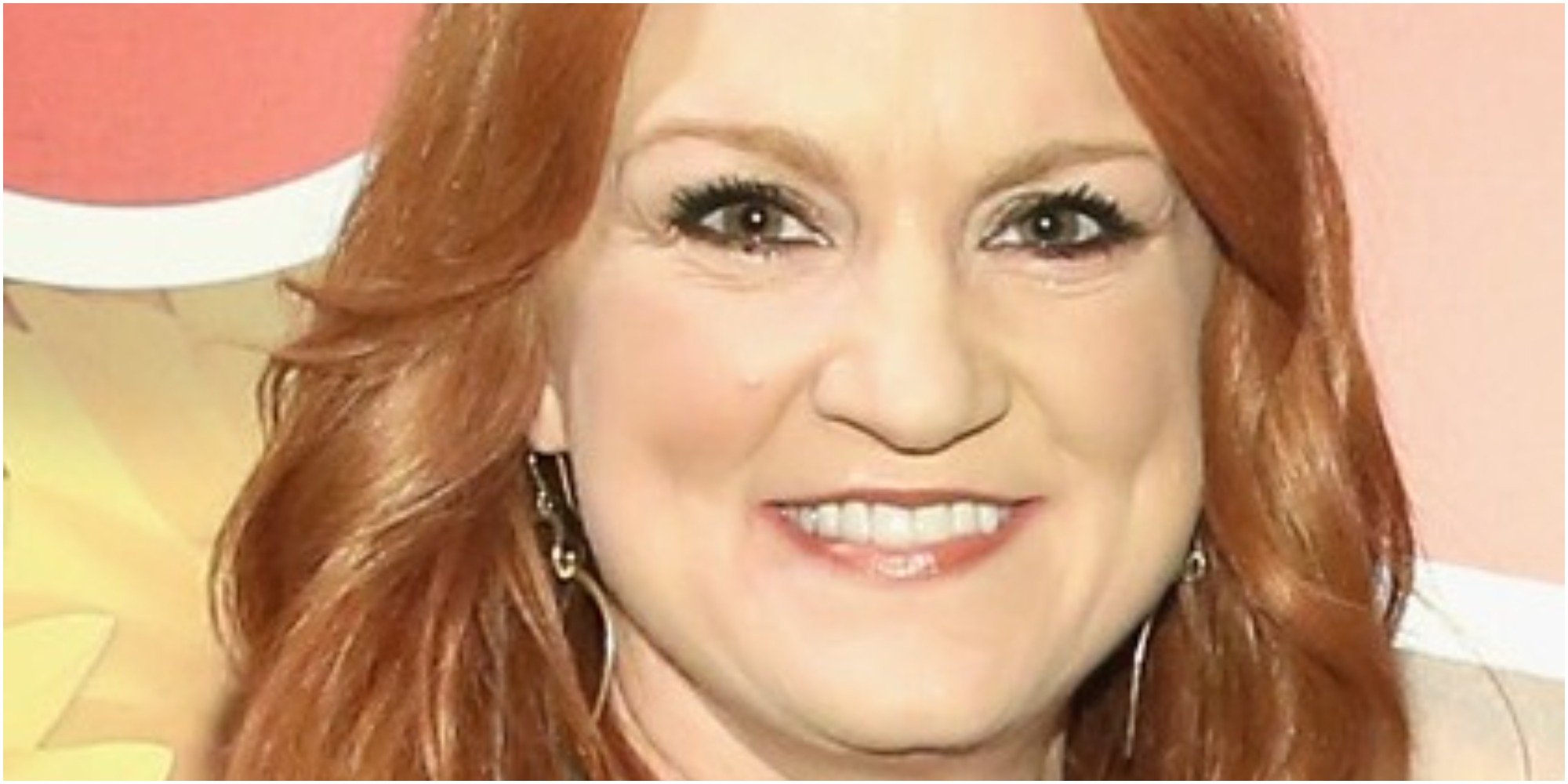 Ree Drummond poses for a press photograph in a floral blouse.