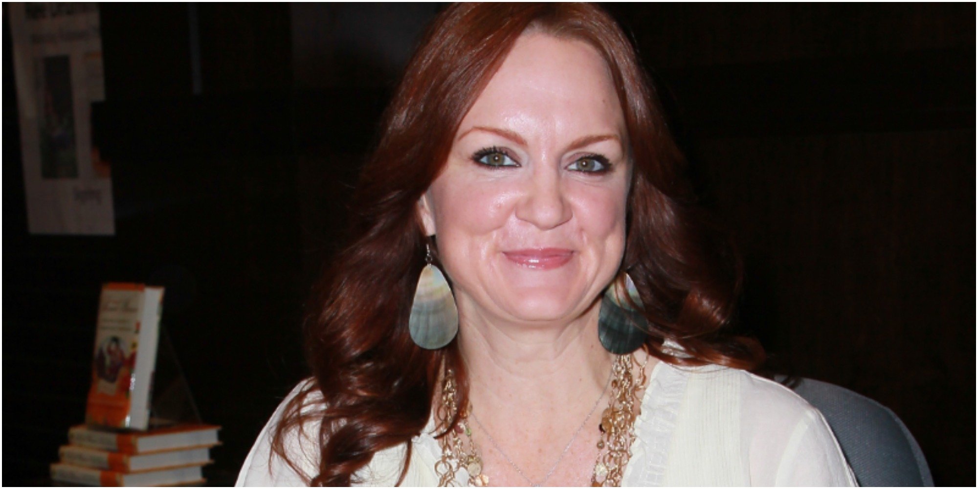 Ree Drummond wars a white shirt in a press photograph.