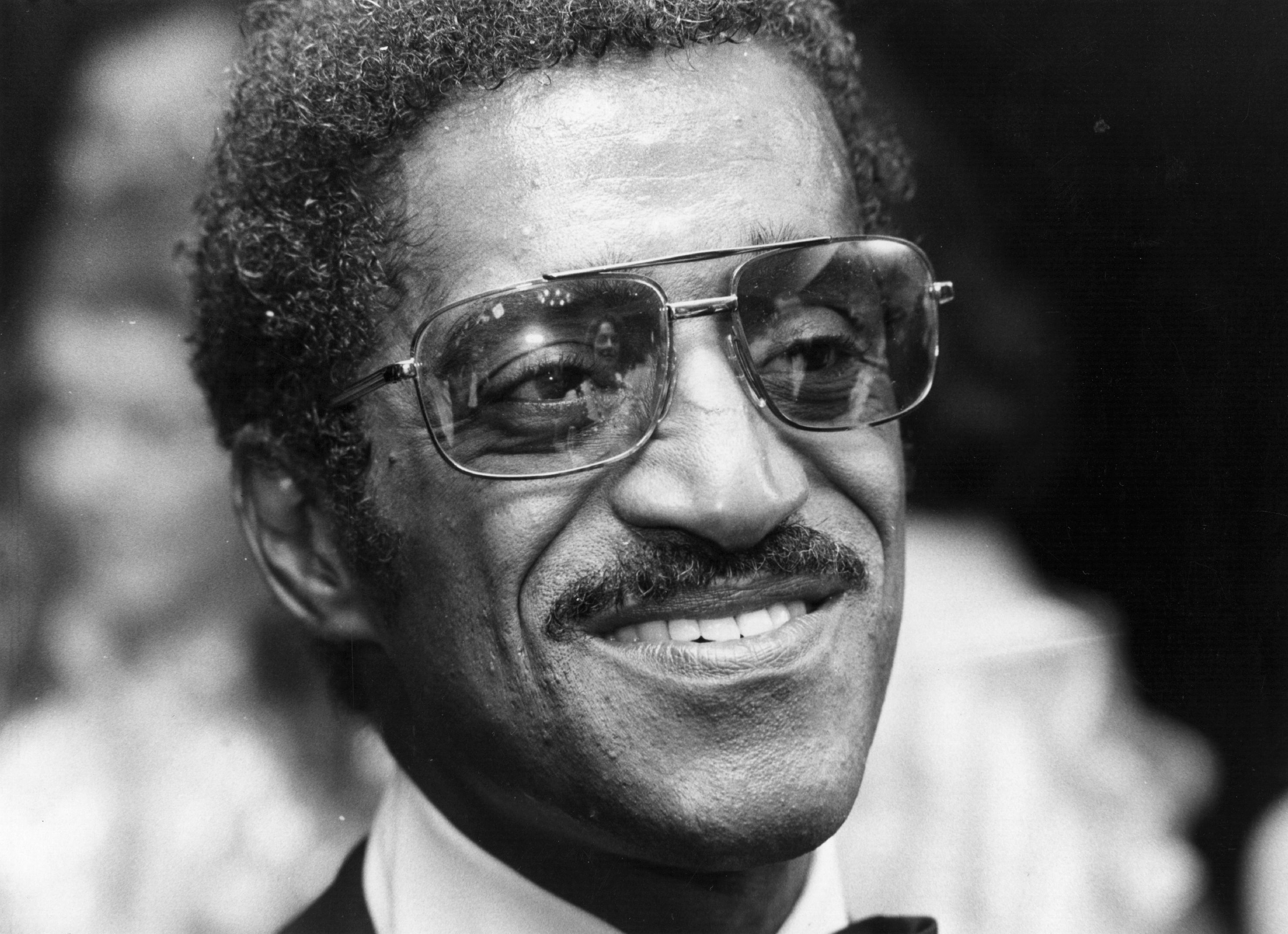 Sammy Davis Jr. wearing glasses