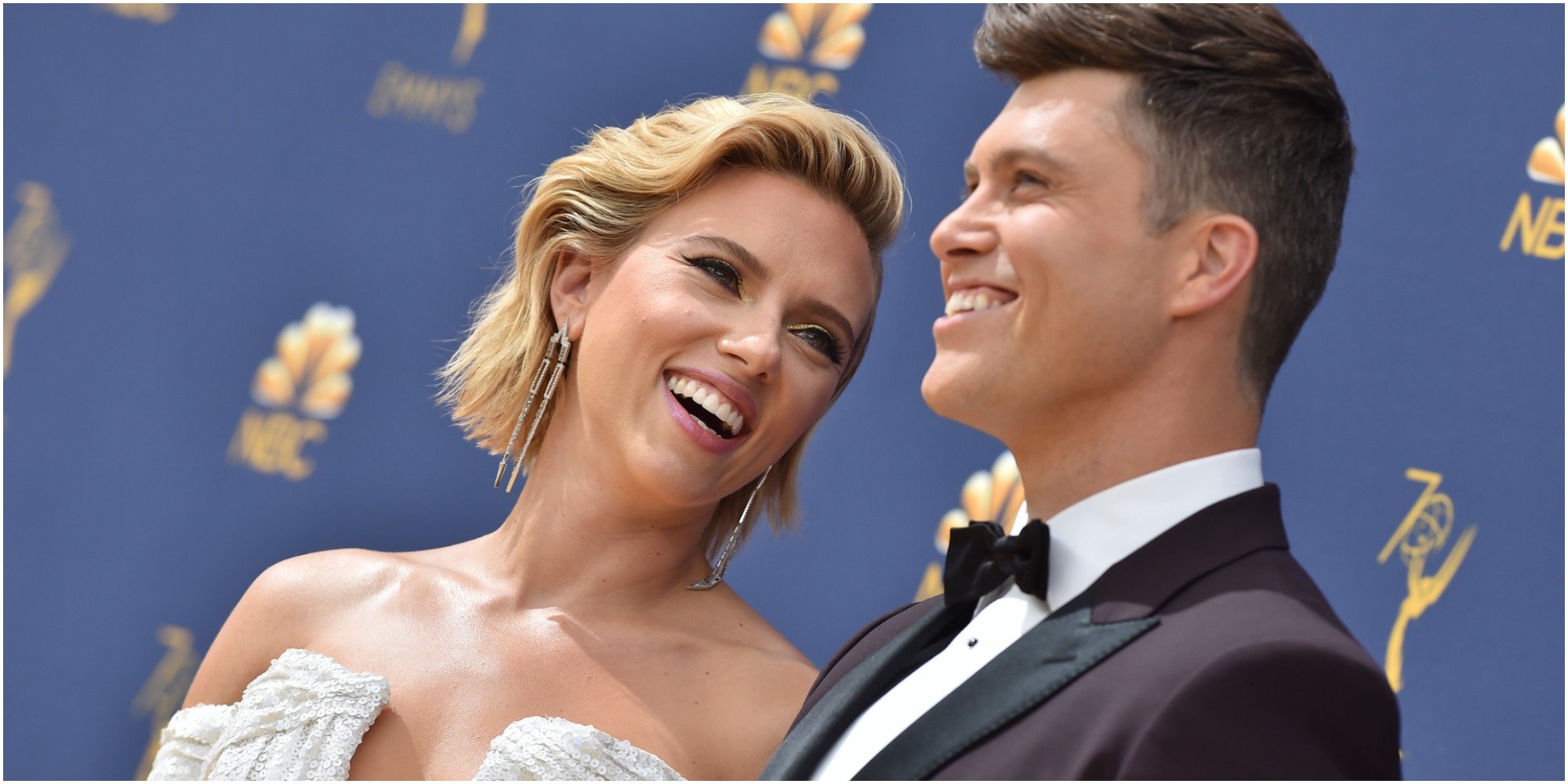Colin Jost and Scarlett Johannsson pose on the red carpet for the 70th Emmy Awards at Microsoft Theater on September 17, 2018.